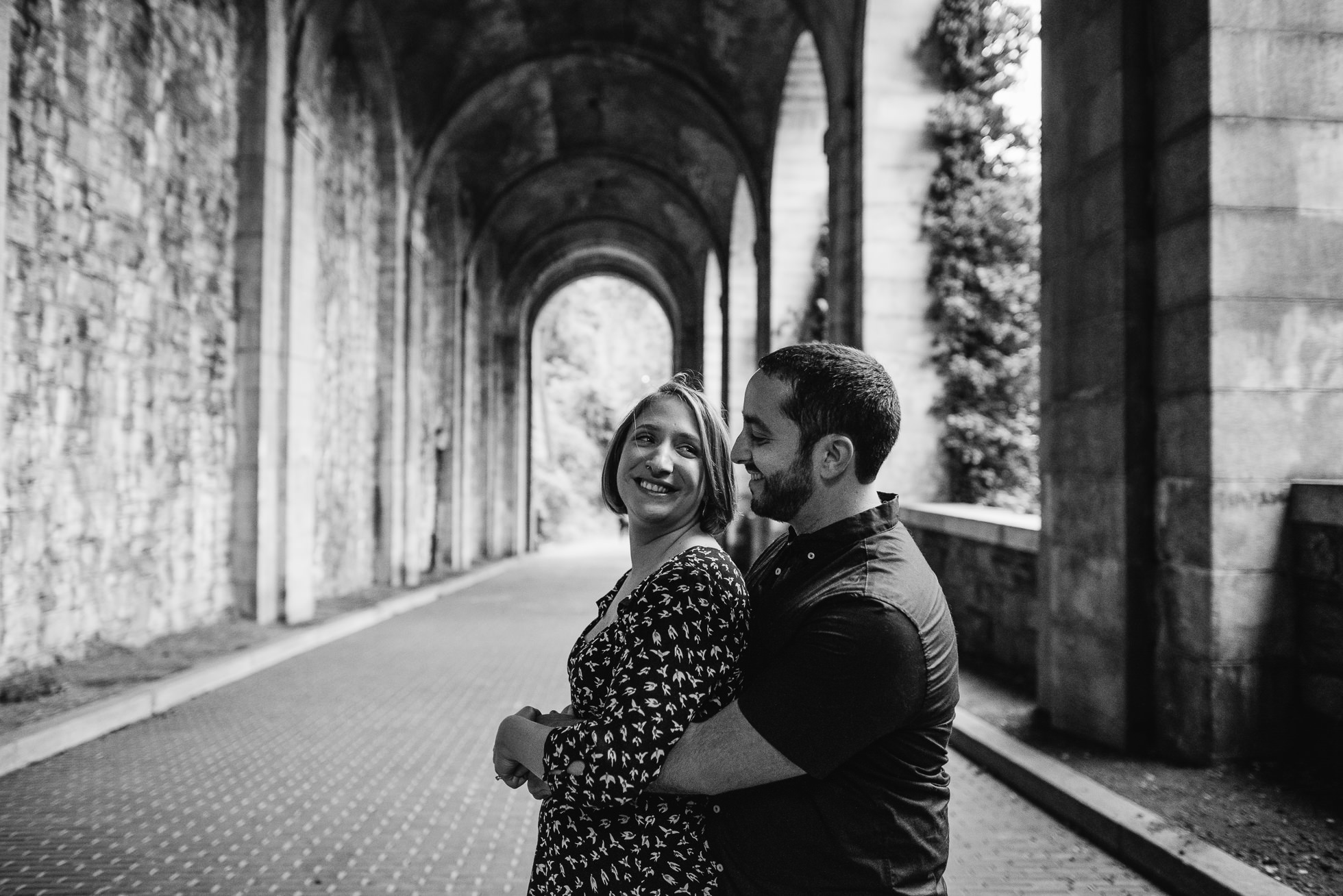 engagement photos under arch fort tryon