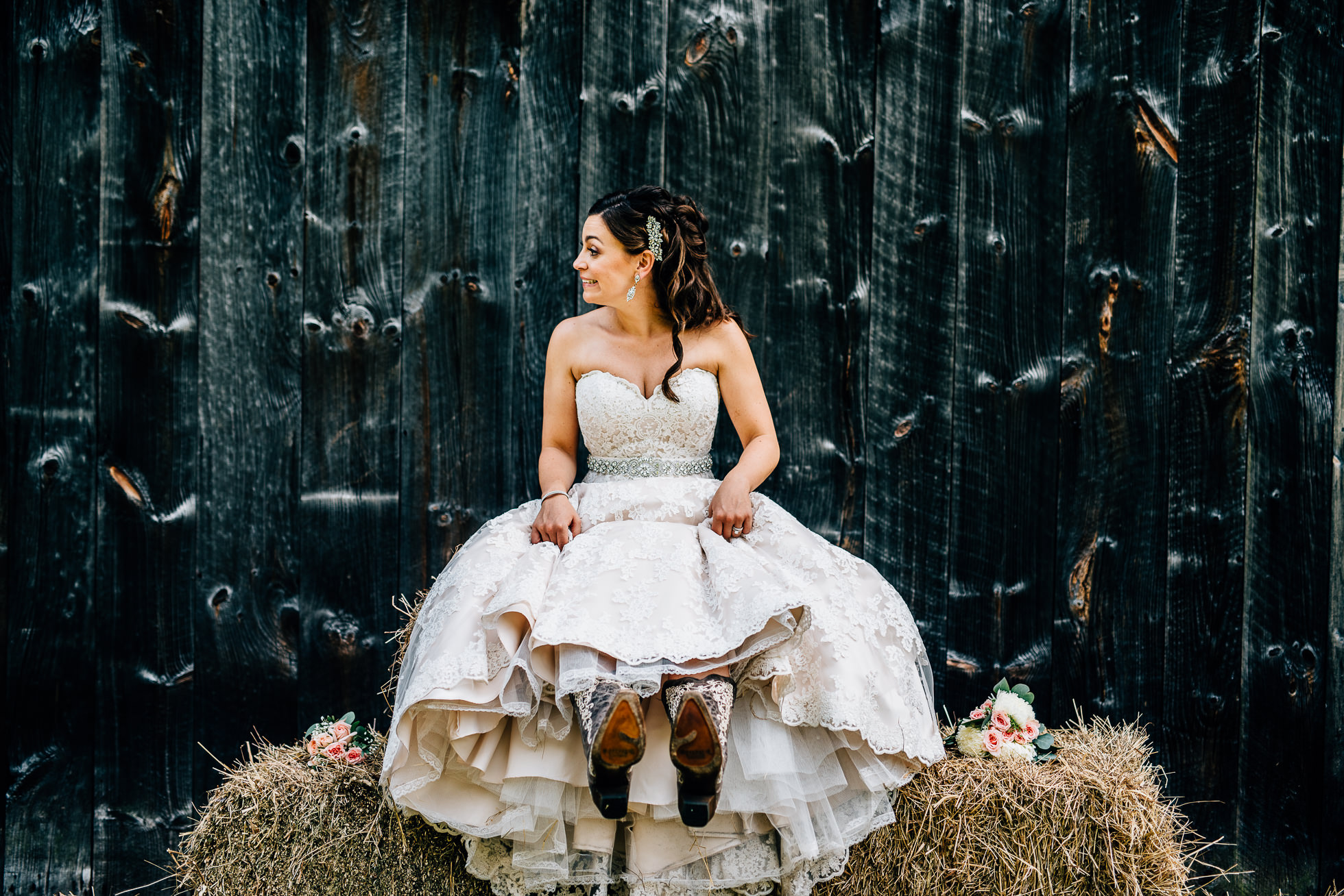 bride in front of barn