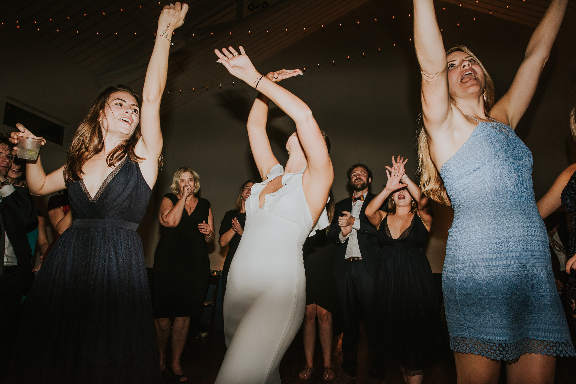 bride and friends dancing at wedding reception at the cordelle nashville wedding