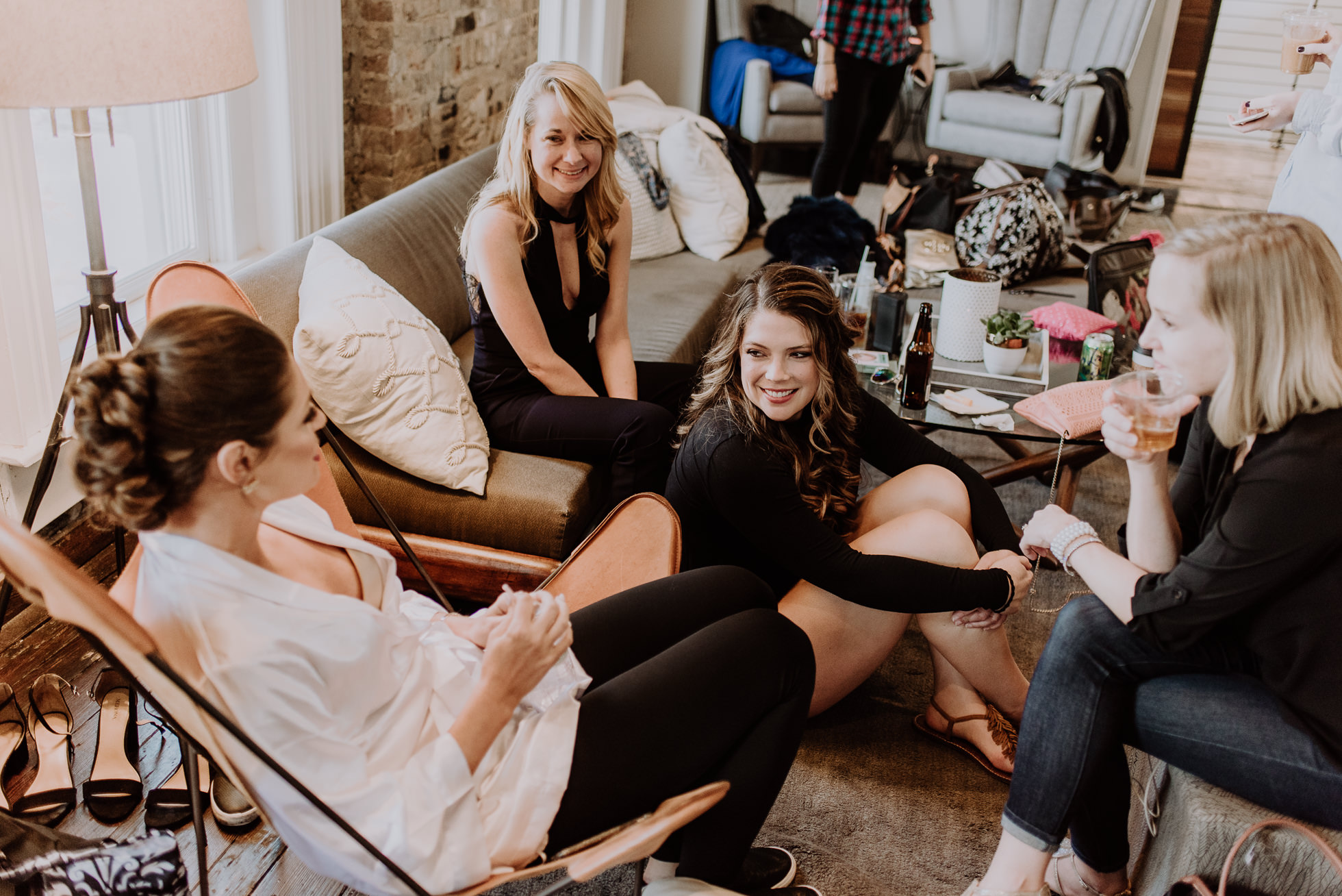 bride and friends getting ready the cordelle