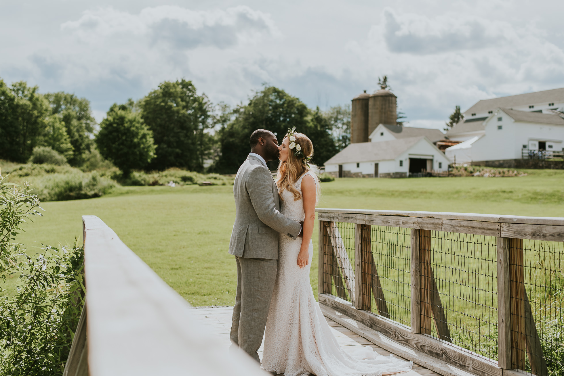 rustic wedding first kiss photographed by Traverse the Tides