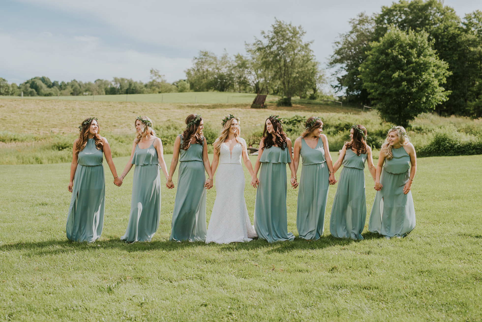 bridesmaids wearing flower crowns photographed by Traverse the Tides