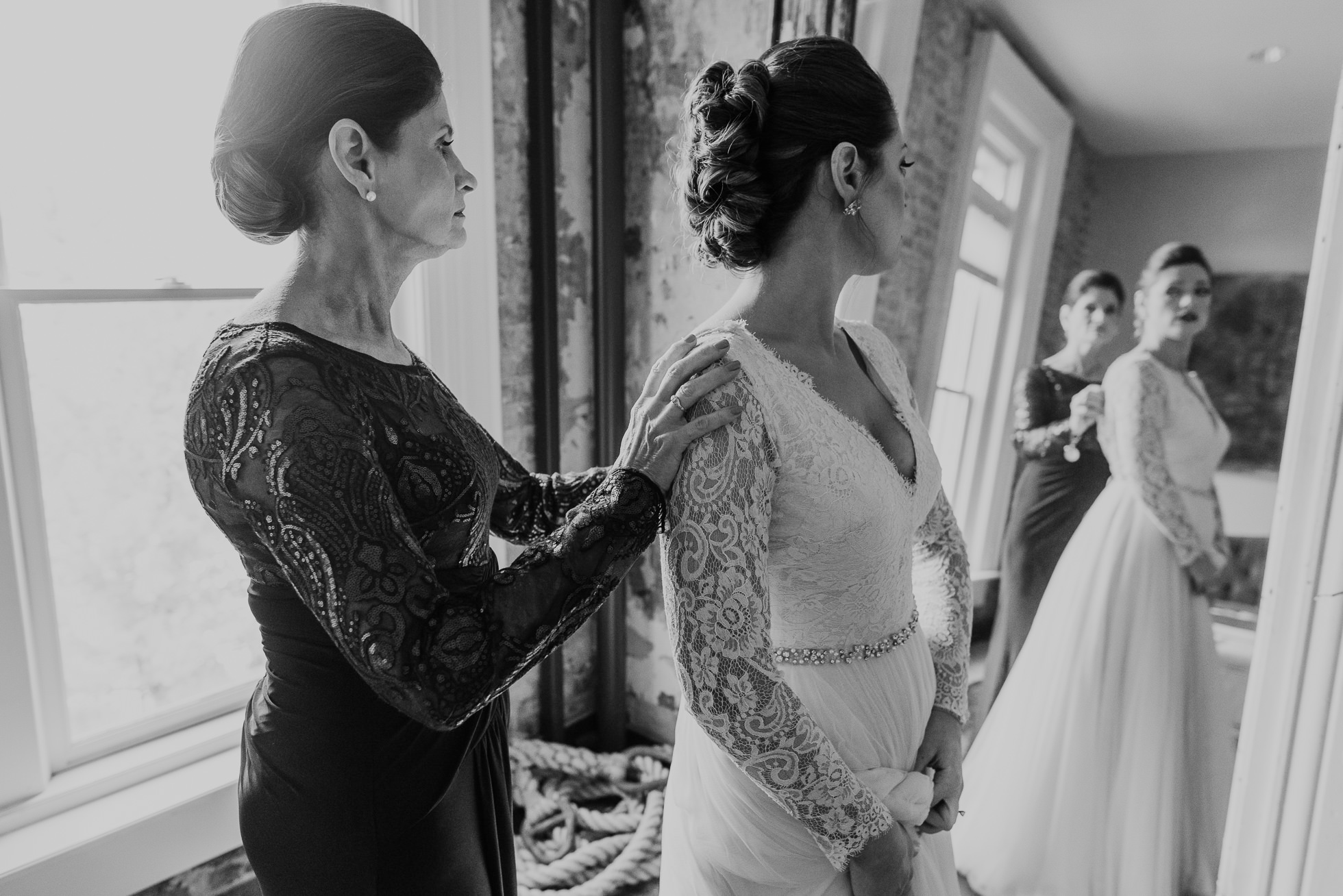 mom helping bride get ready the cordelle nashville wedding