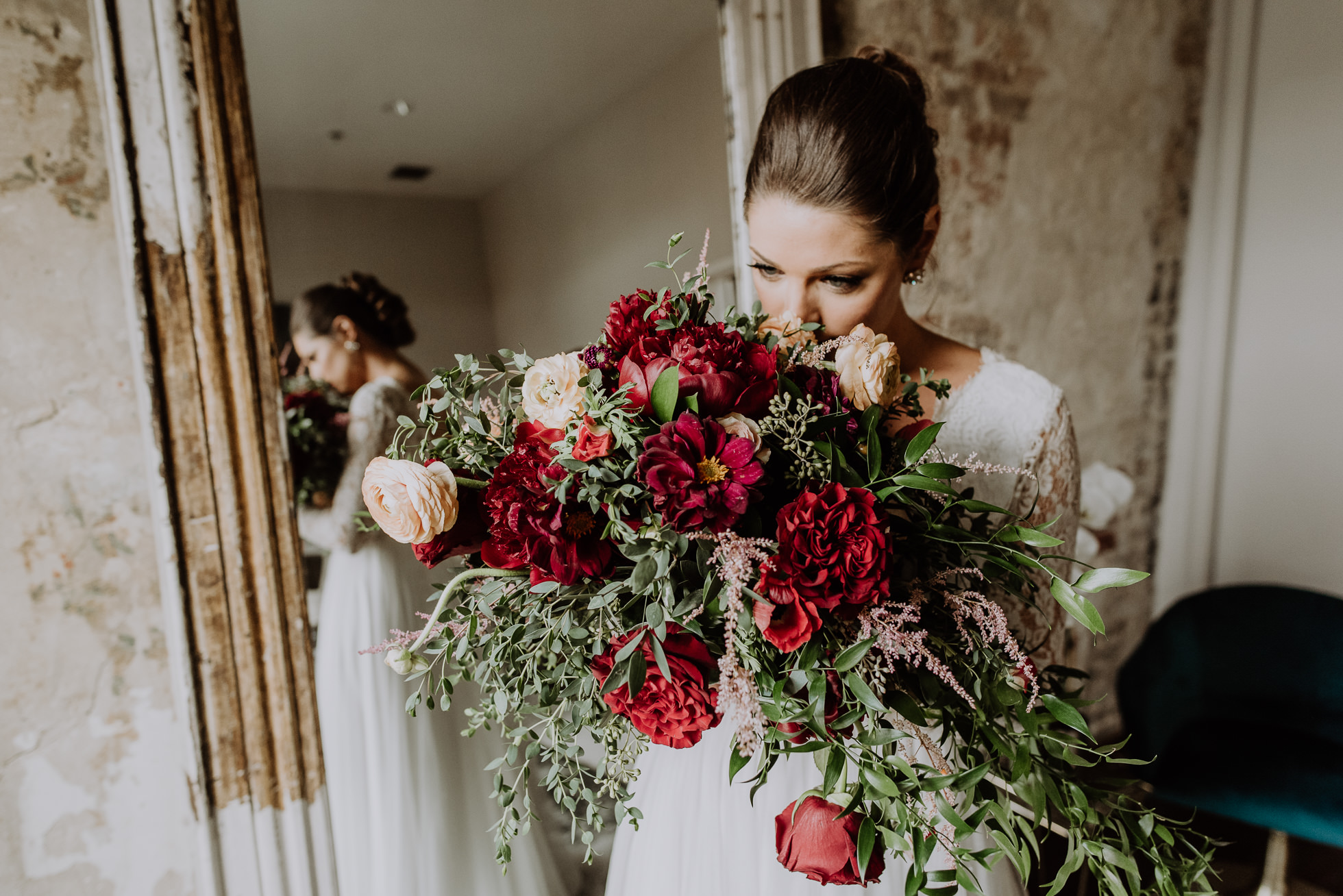 bride smelling flowers the cordelle nashville wedding