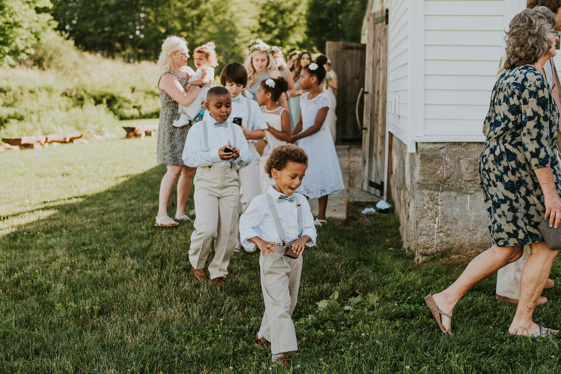 ring bearer farm wedding photographed by Traverse the Tides