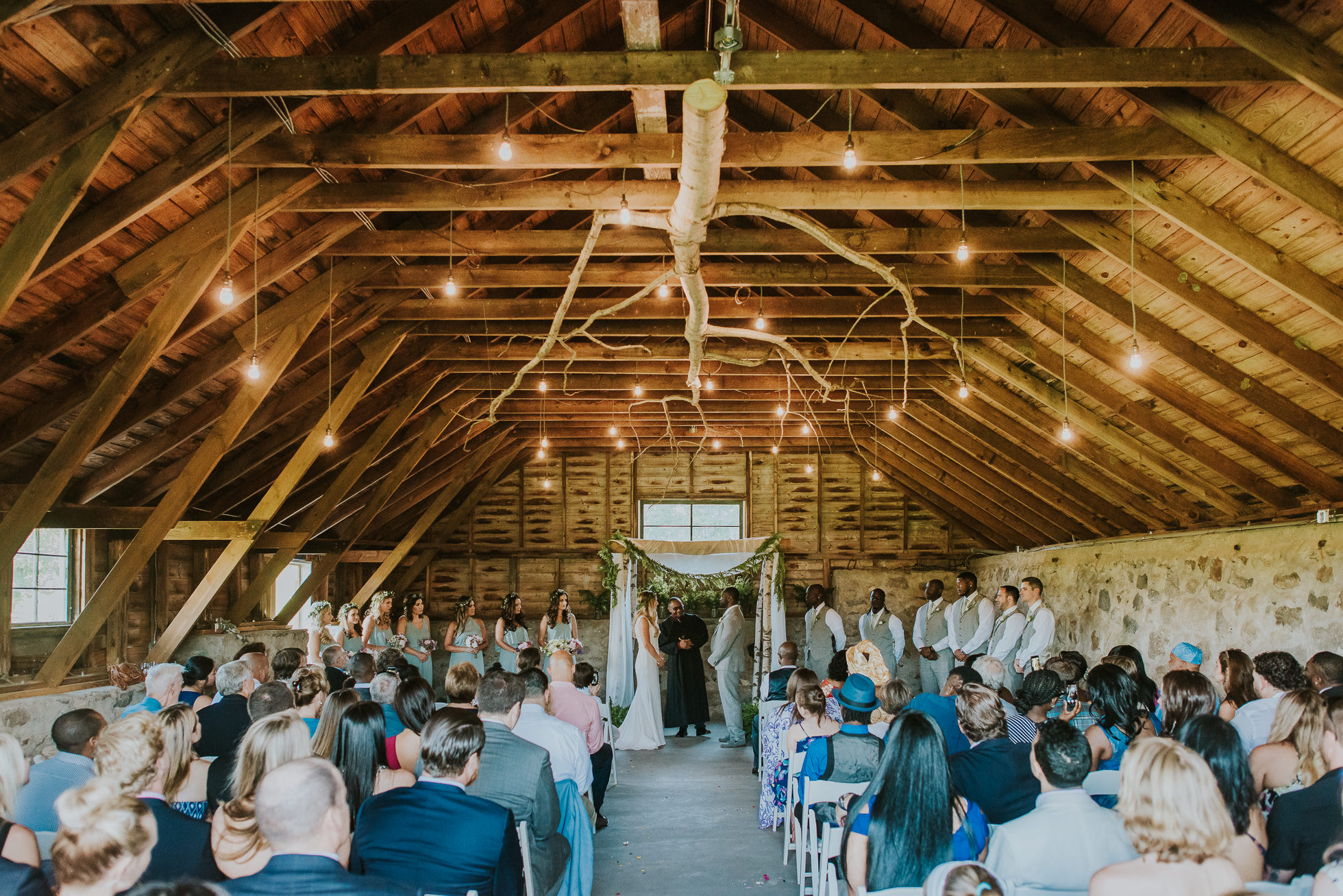 farm wedding ceremony photographed by Traverse the Tides