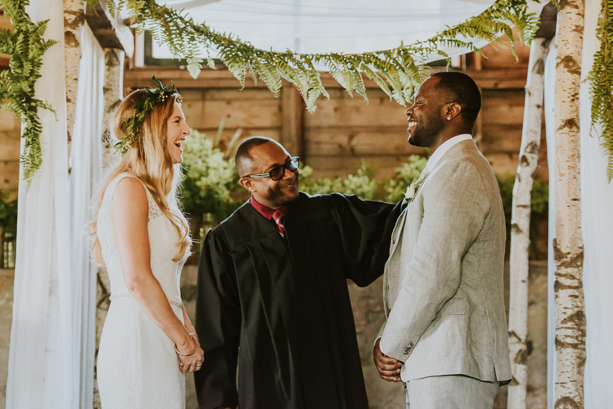 rustic wedding ceremony photographed by Traverse the Tides