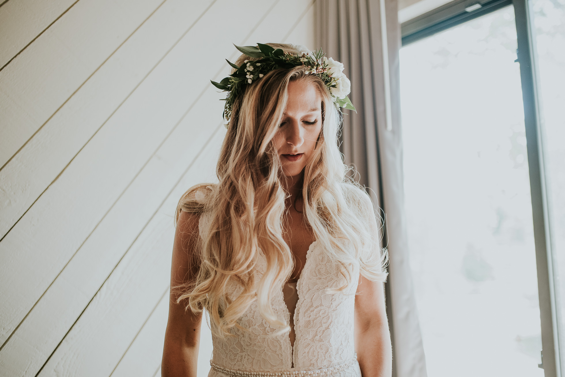 bride getting ready photographed by Traverse the Tides