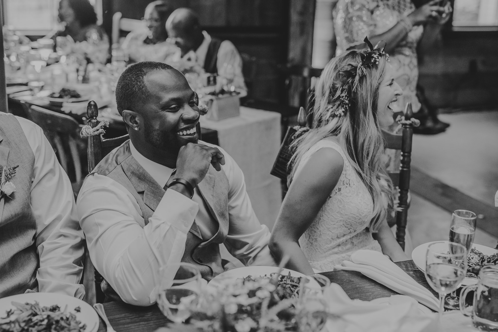 bride and groom in black and white photographed by Traverse the Tides