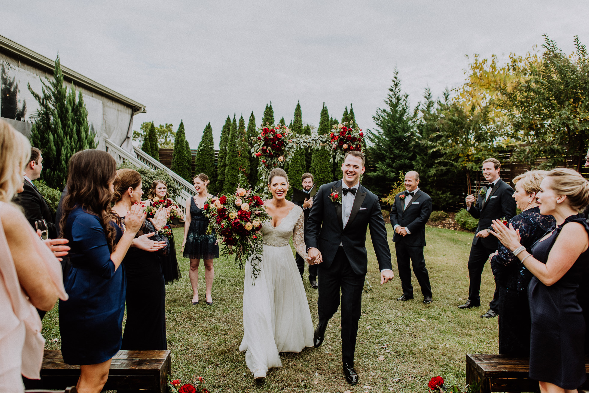 bride and groom walking down the aisle the cordelle nashville wedding