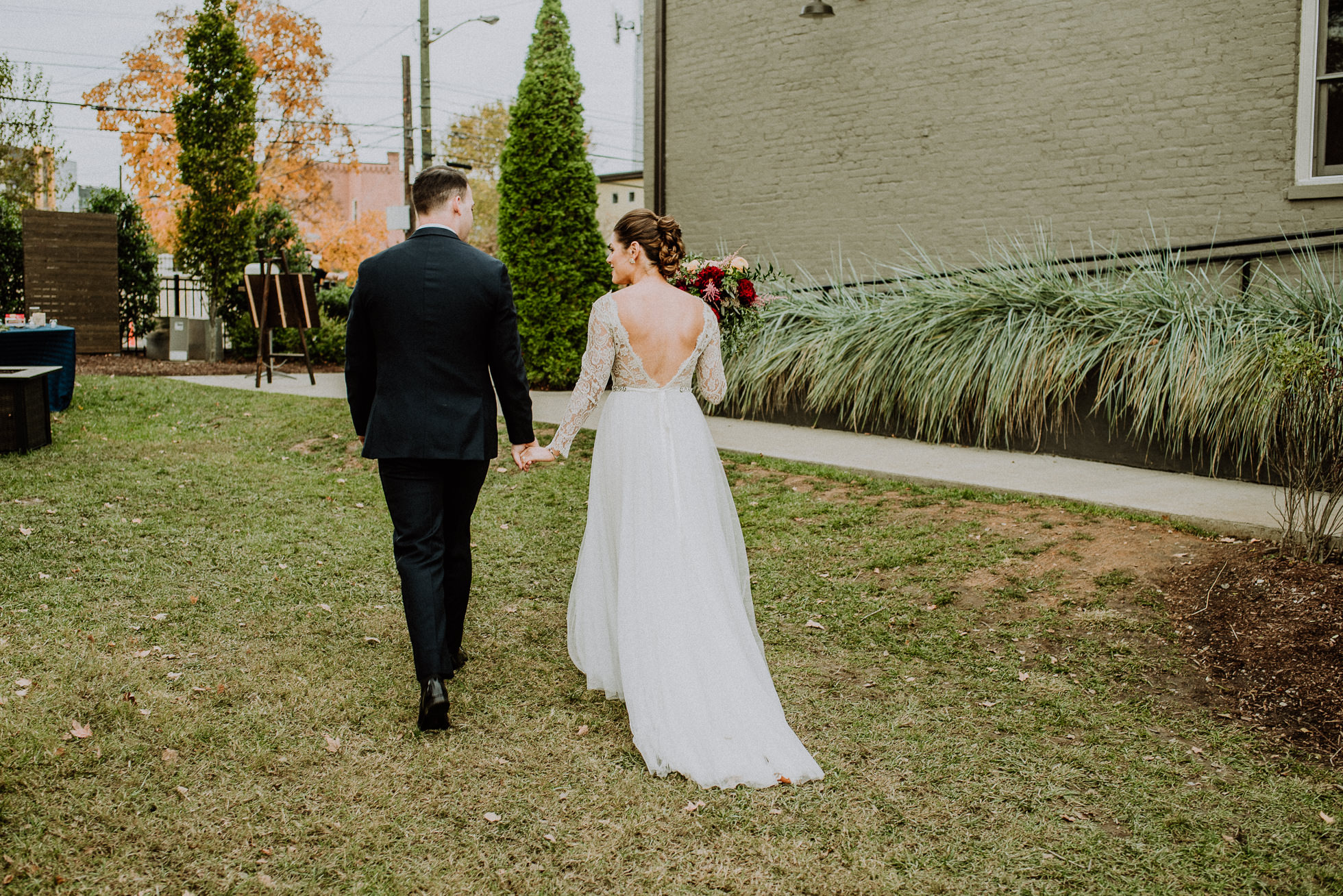 bride and groom exiting ceremony at the cordelle nashville wedding