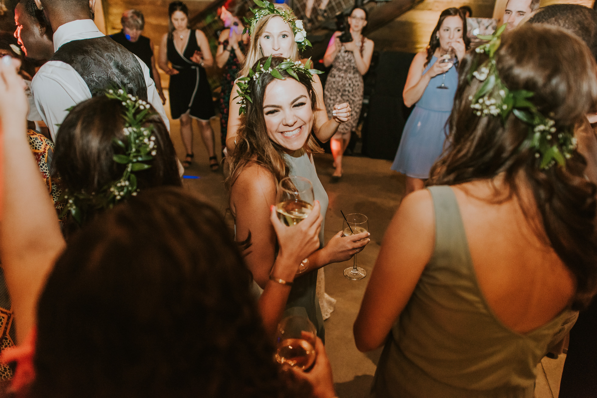 bridesmaids dancing photographed by Traverse the Tides