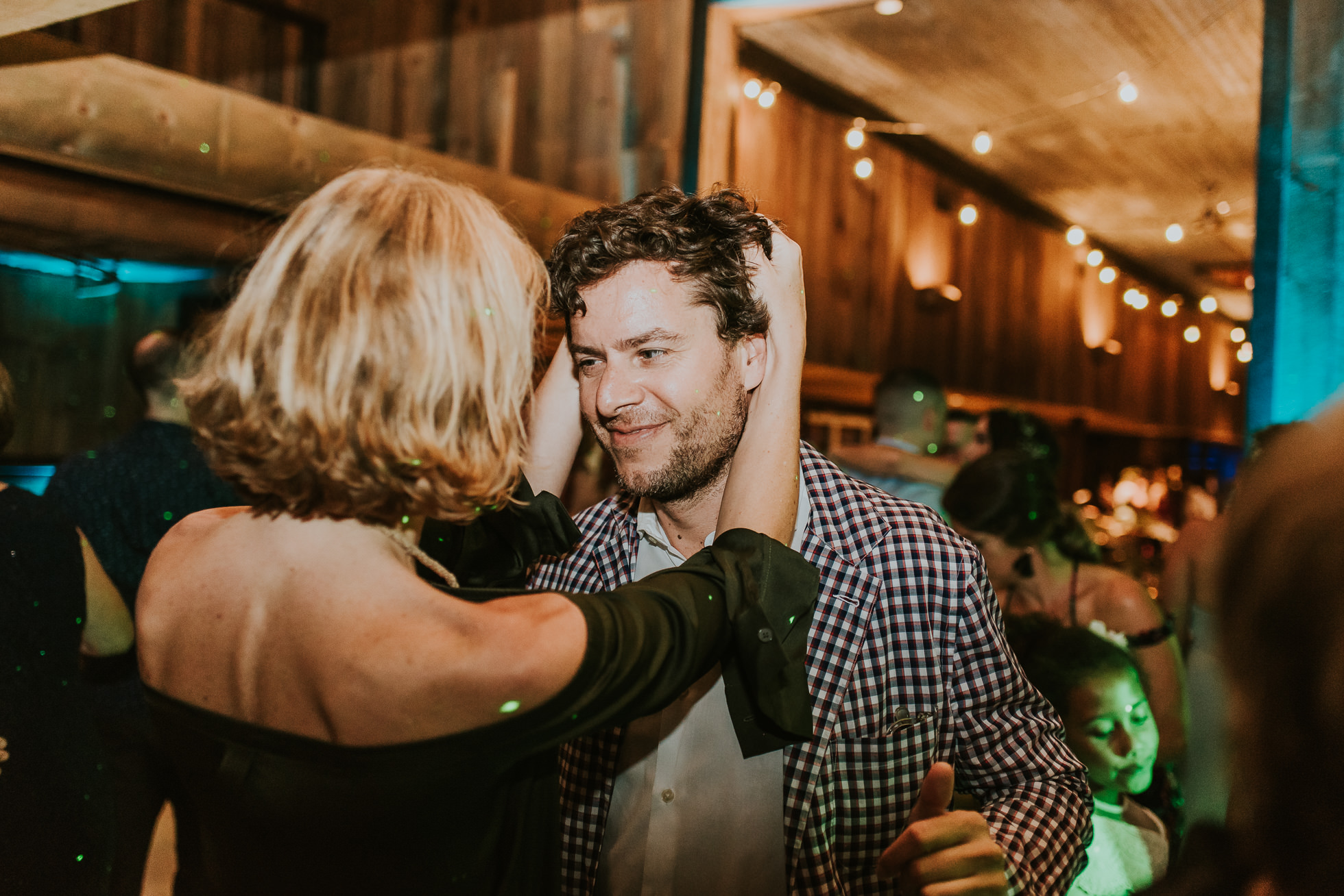 drunk wedding guests photographed by Traverse the Tides