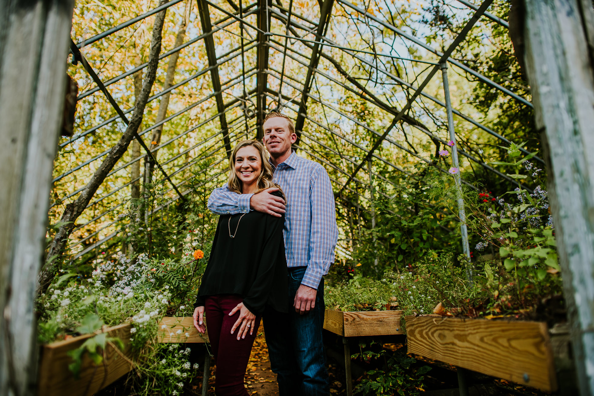 abandoned greenhouse engagement session photographed by Traverse the Tides