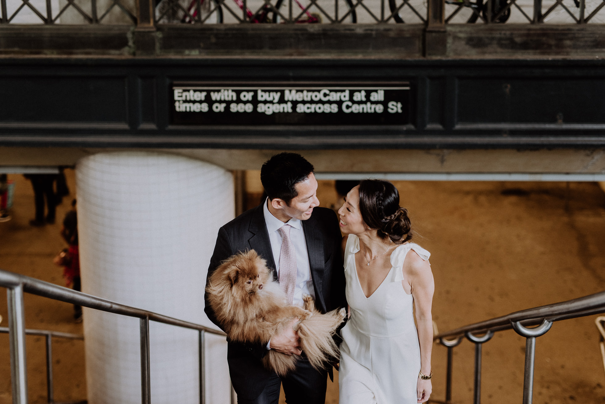 bride and groom with dog