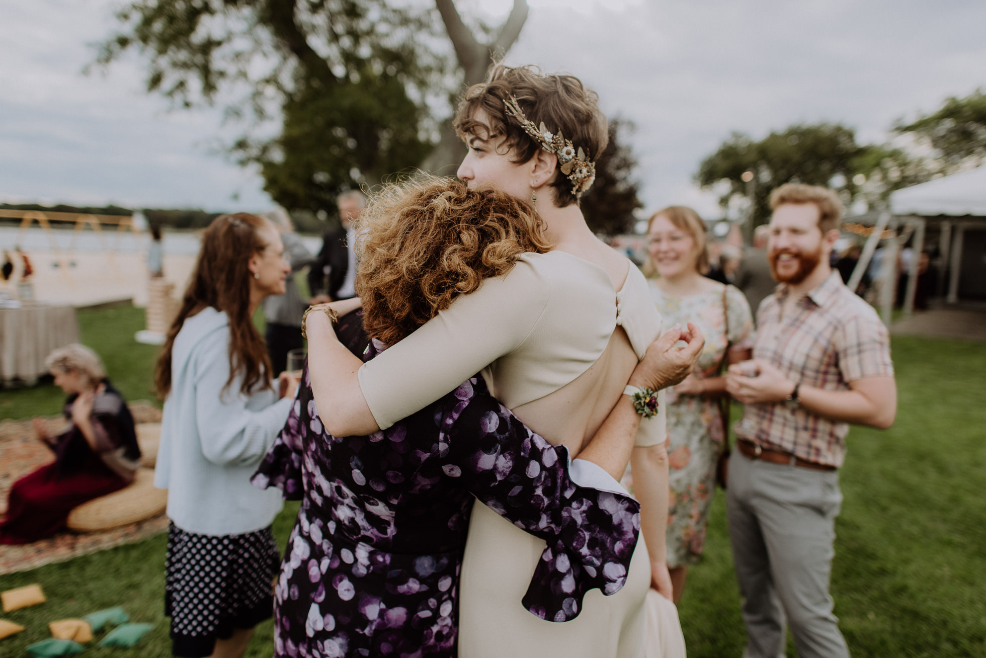 bride and mother in law hugging