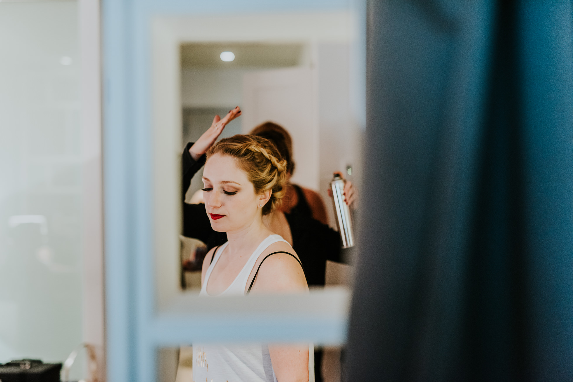 bride getting ready photographed by Traverse The Tides