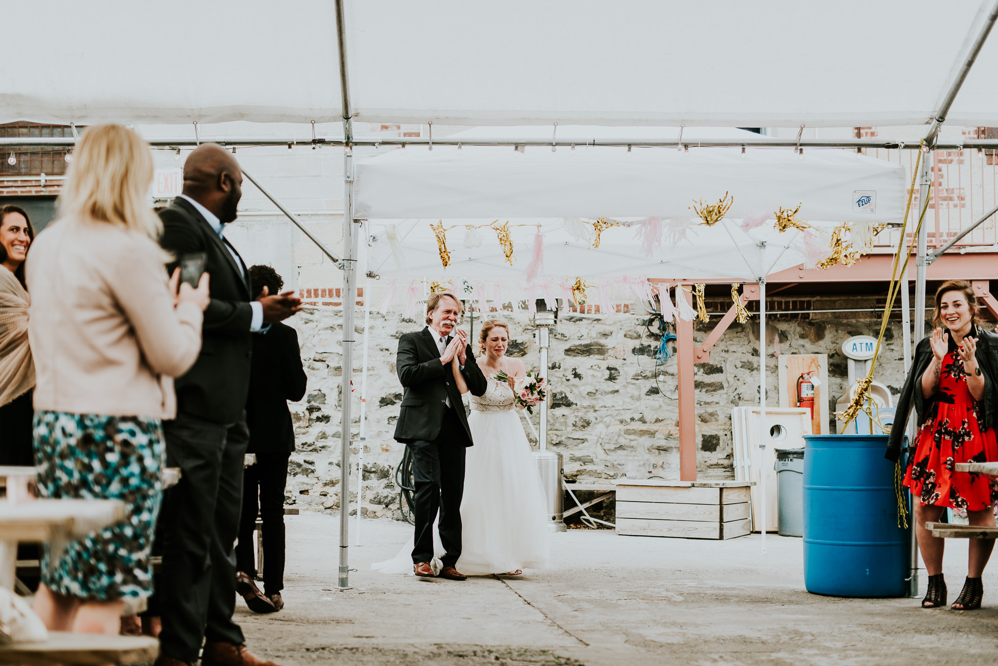 bride with father photographed by Traverse The Tides