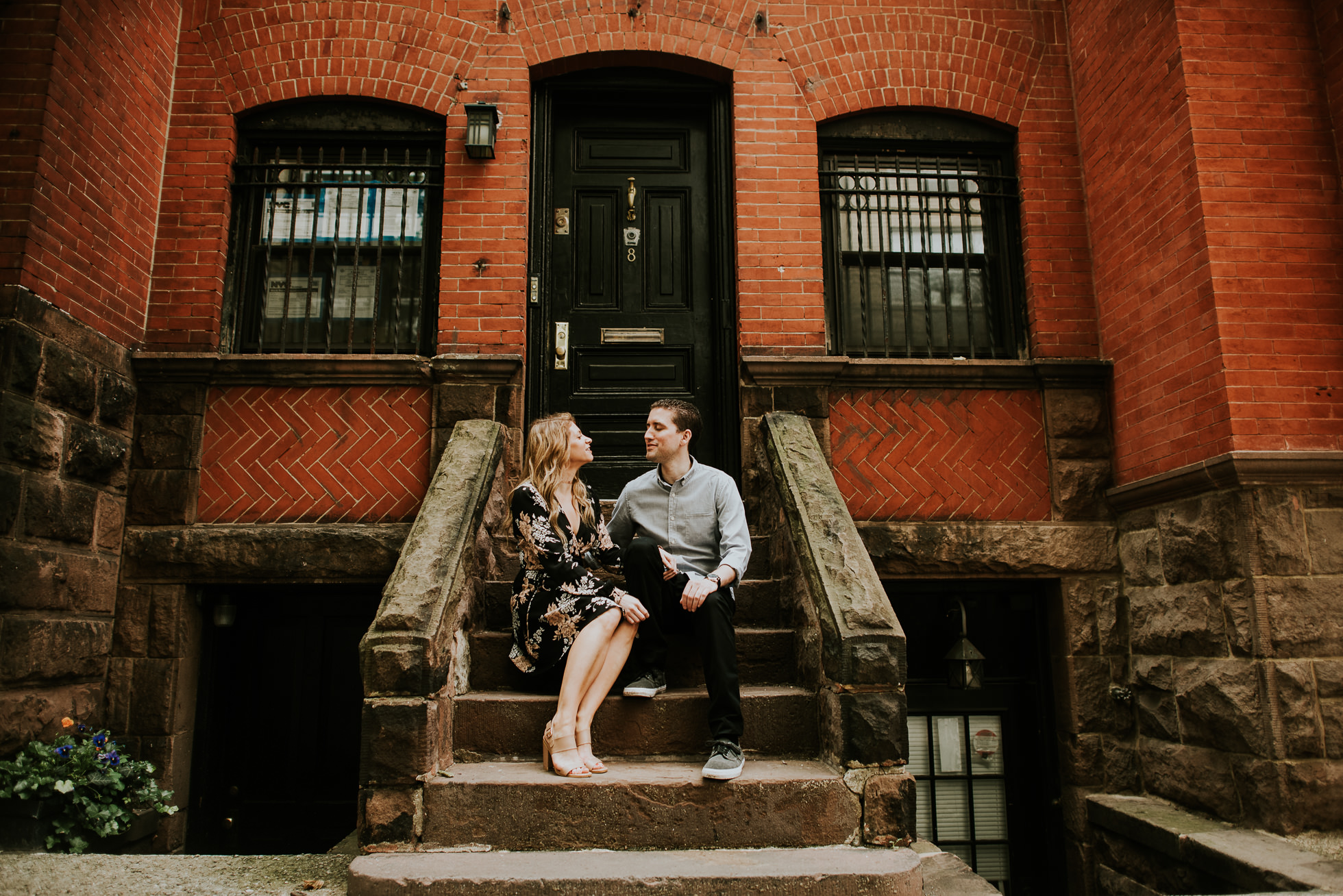 couple on stairs engagement photos photographed by Traverse the Tides36