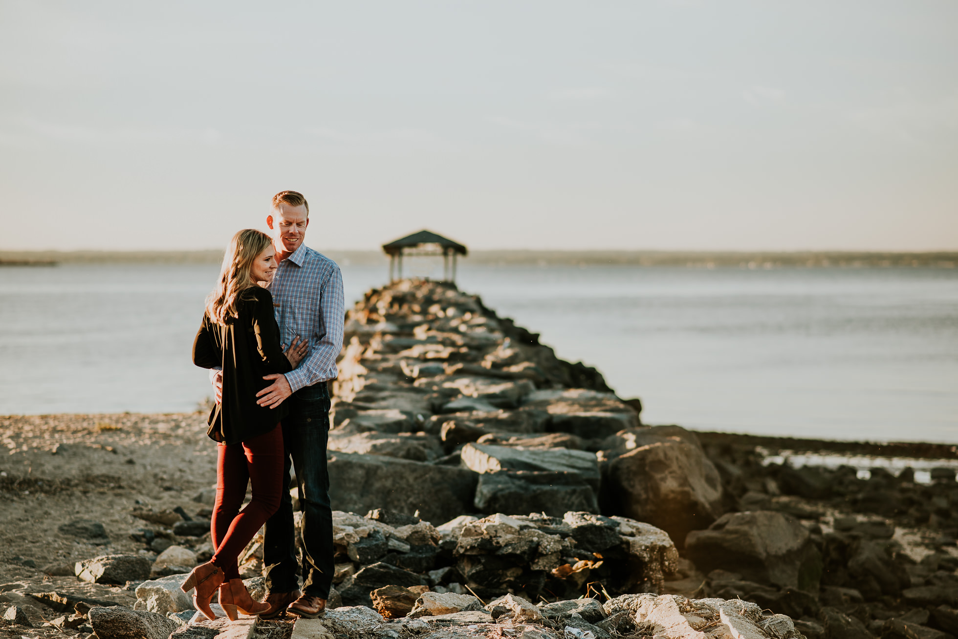 fishing pier engagement session photographed by Traverse the Tides