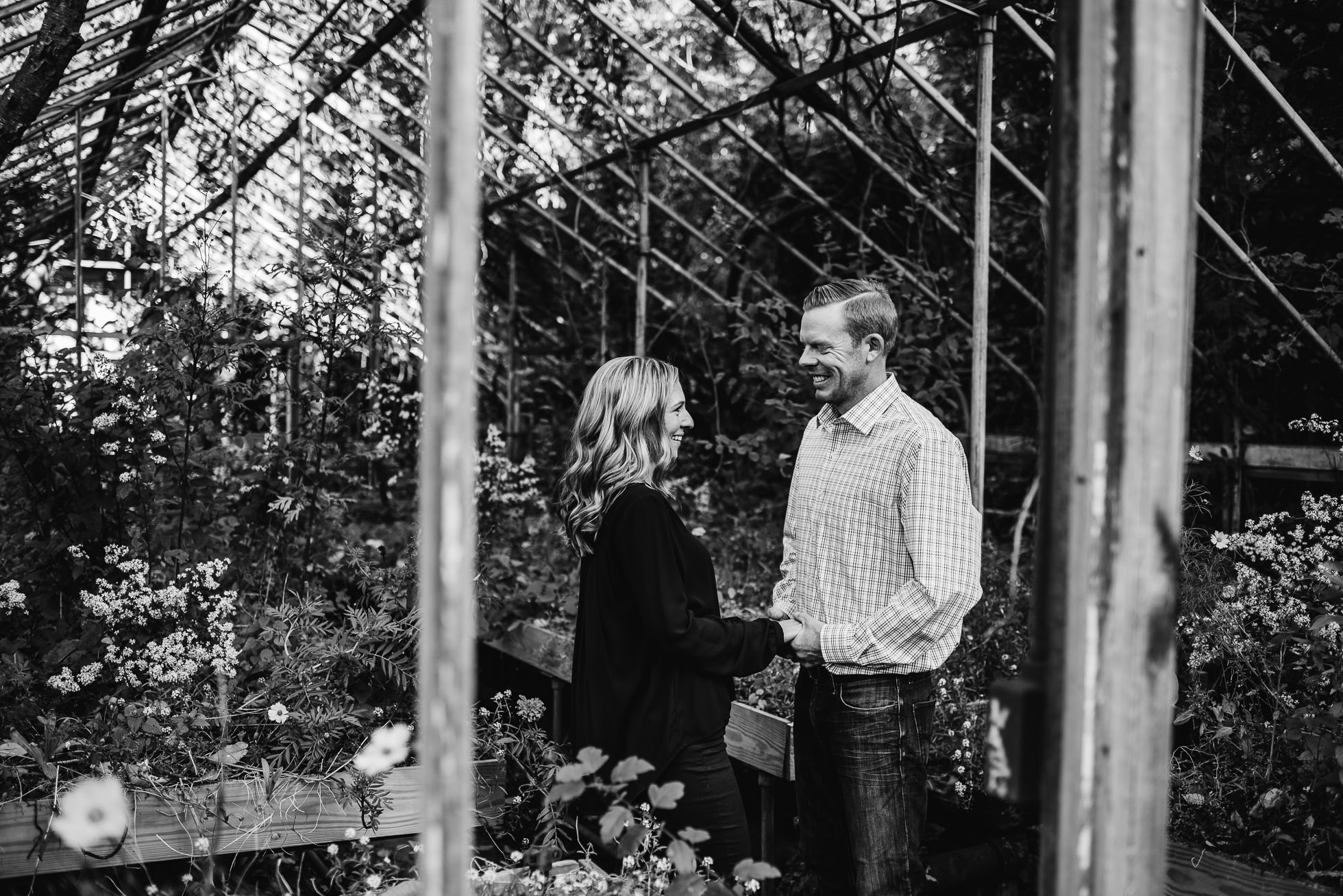 greenhouse engagement session photographed by Traverse the Tides