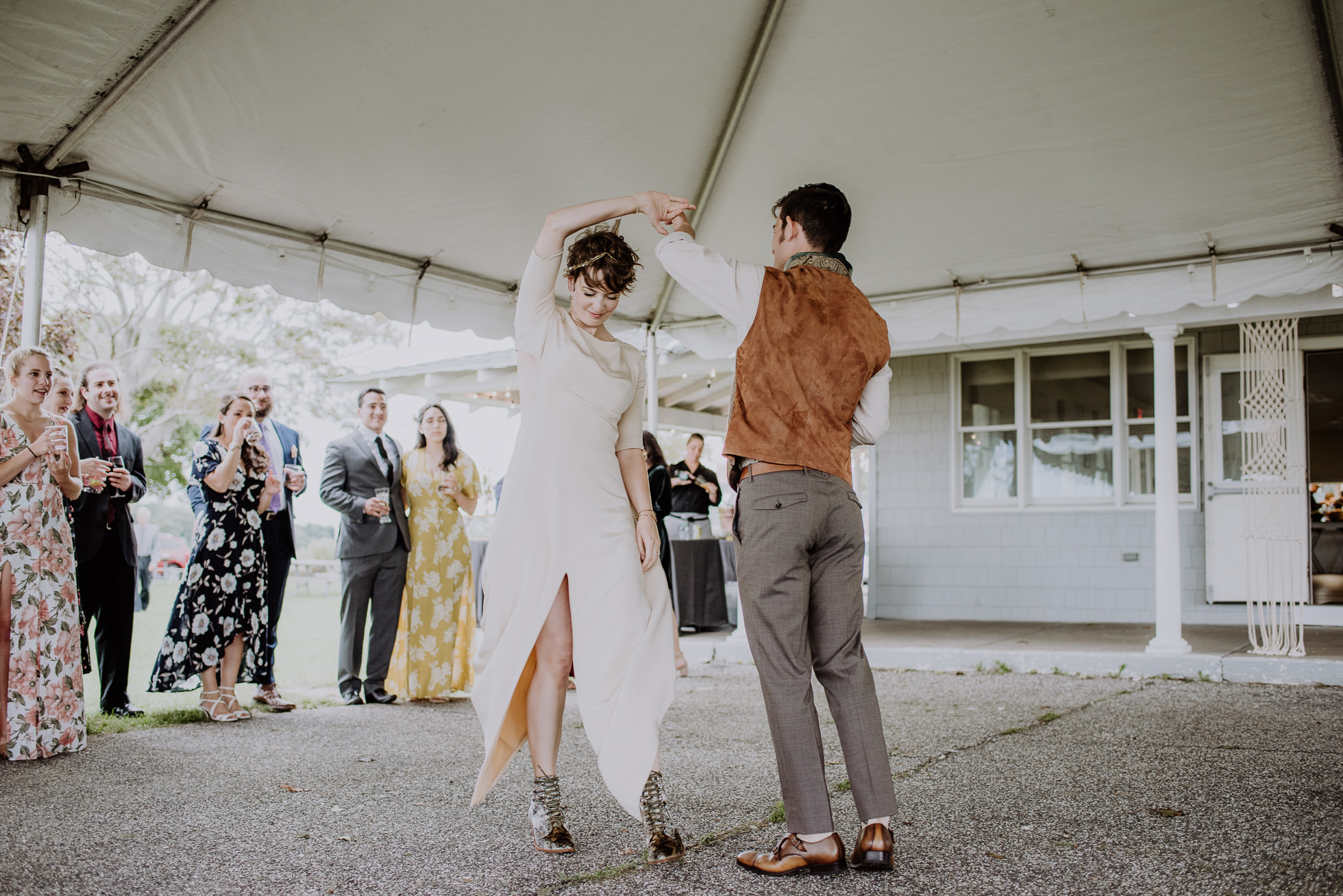 groom spinning bride