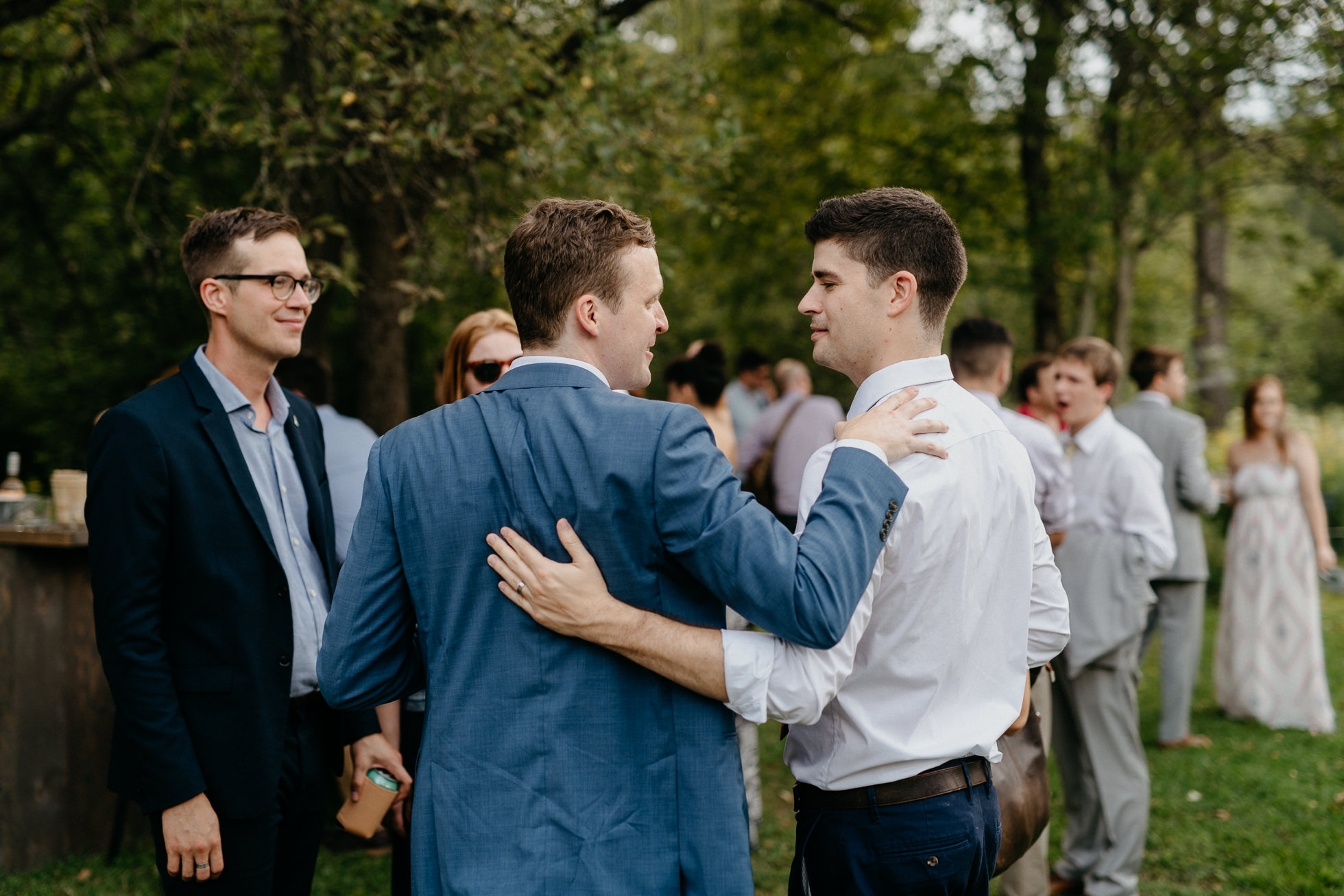 groom with friends at wedding