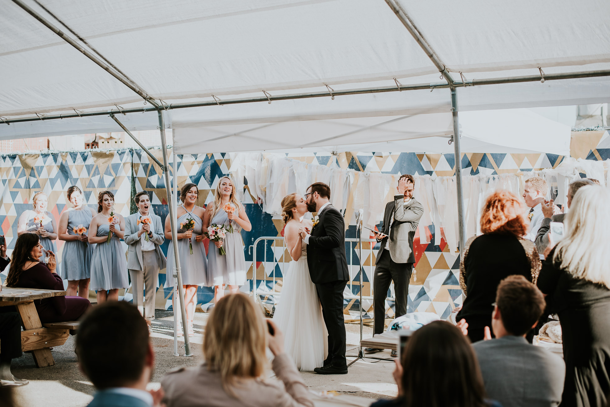 wedding first kiss photographed by Traverse the Tides