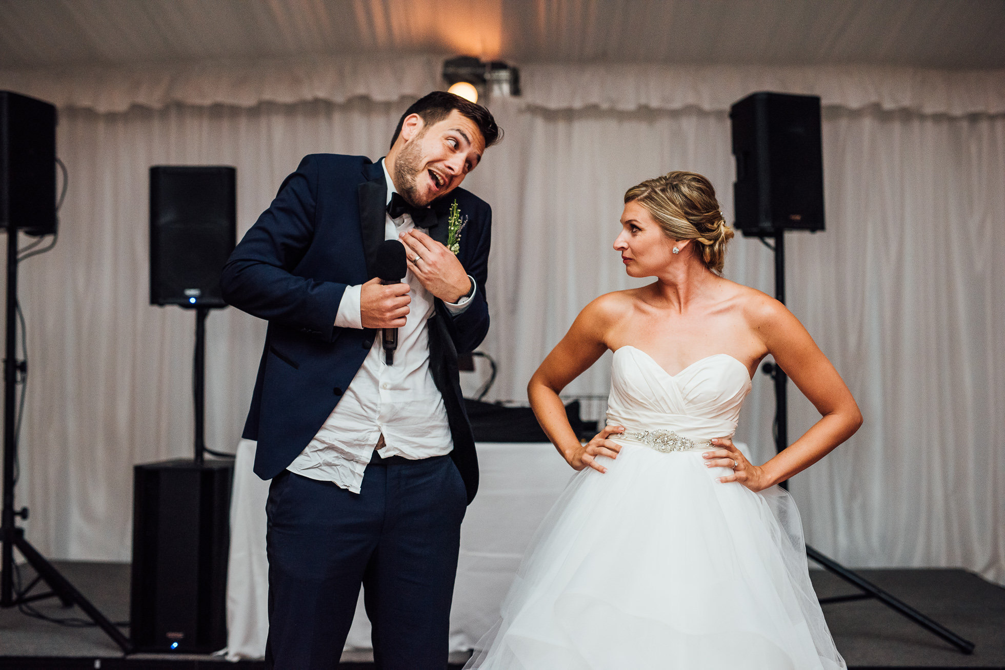 bride and groom sing at lyndhurst castle wedding photographed by traverse the tides-4