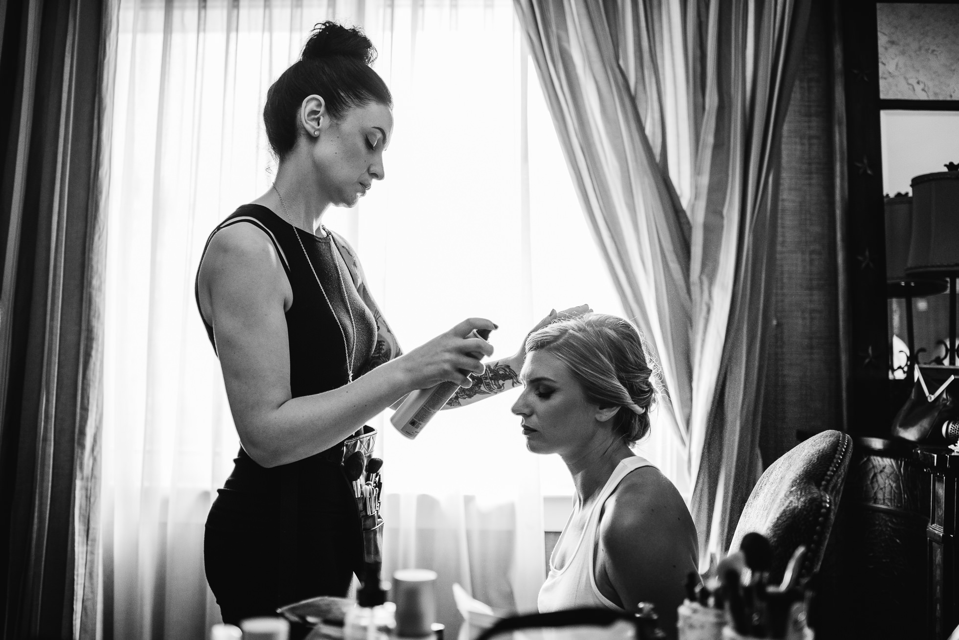 bride getting makeup done at lyndhurst castle wedding photographed by traverse the tides-3