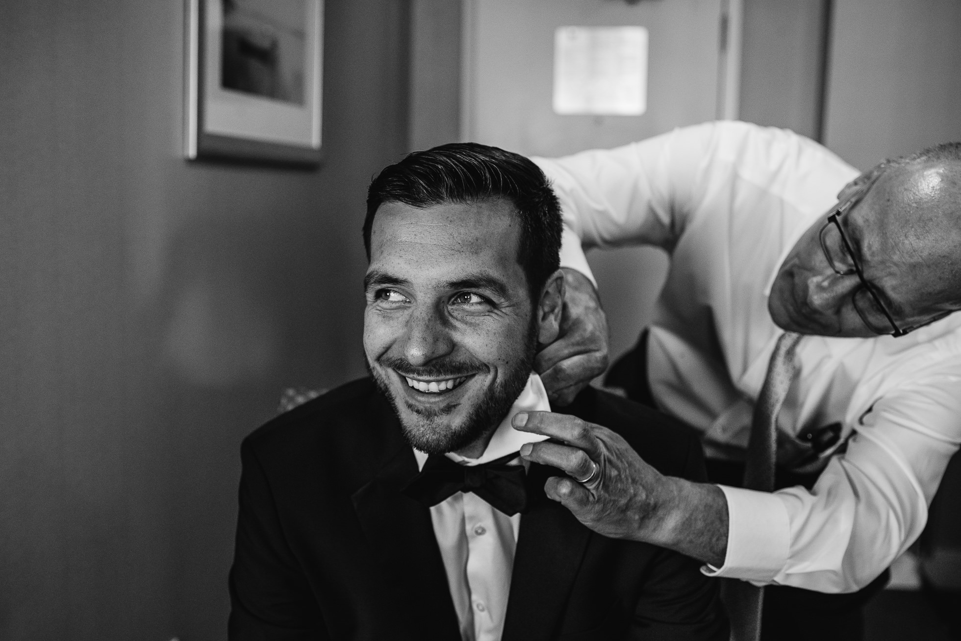 groom and father at lyndhurst castle wedding photographed by traverse the tides