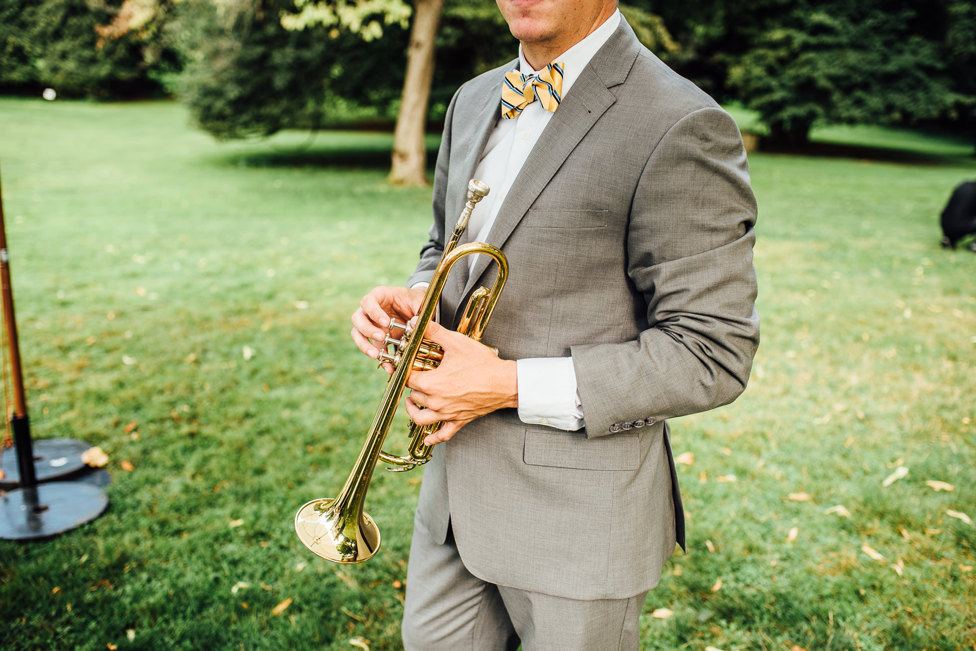 trumpet player at lyndhurst castle photographed by traverse the tides