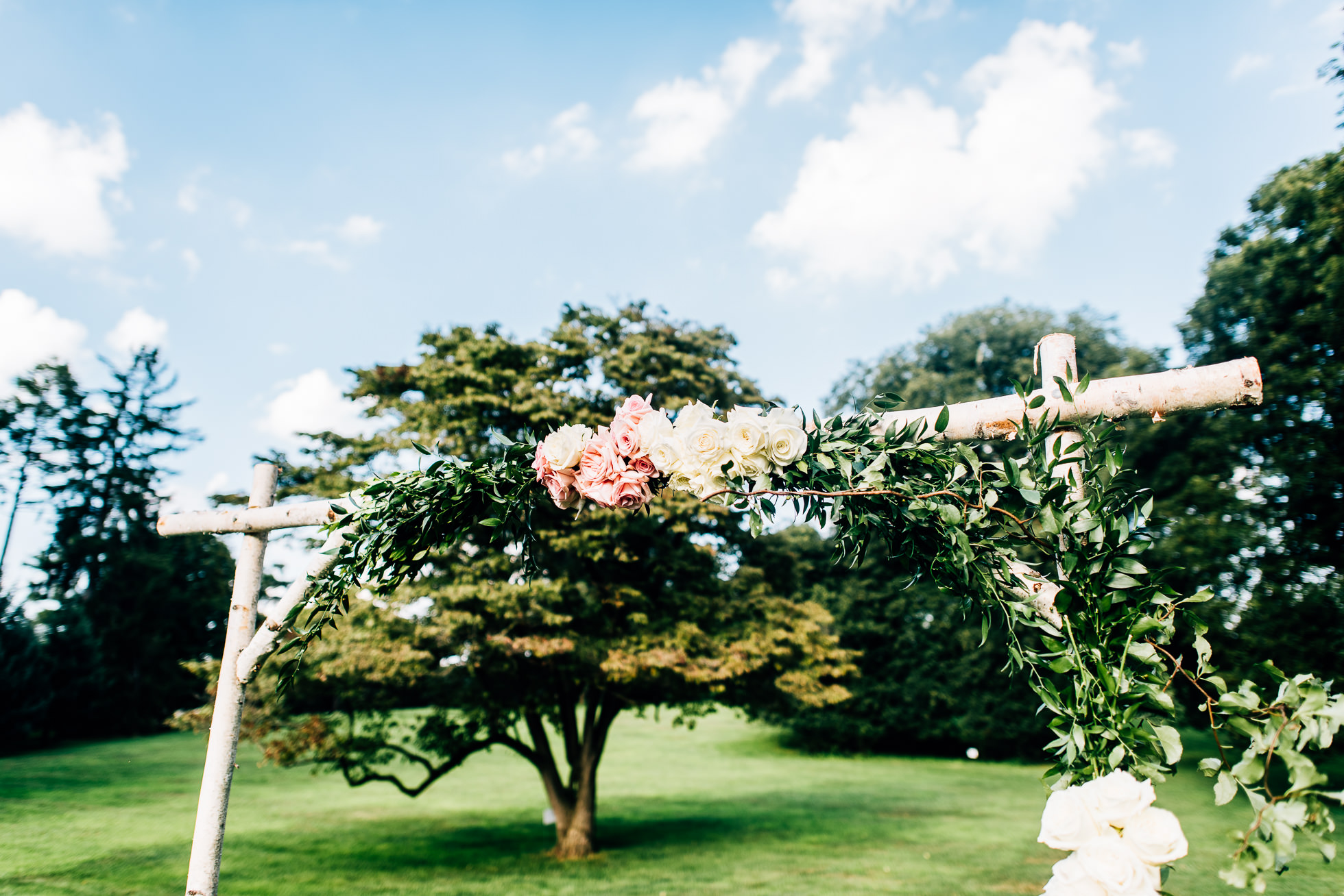 wedding ceremony altar on lawn at lyndhurst castle photographed by traverse the tides