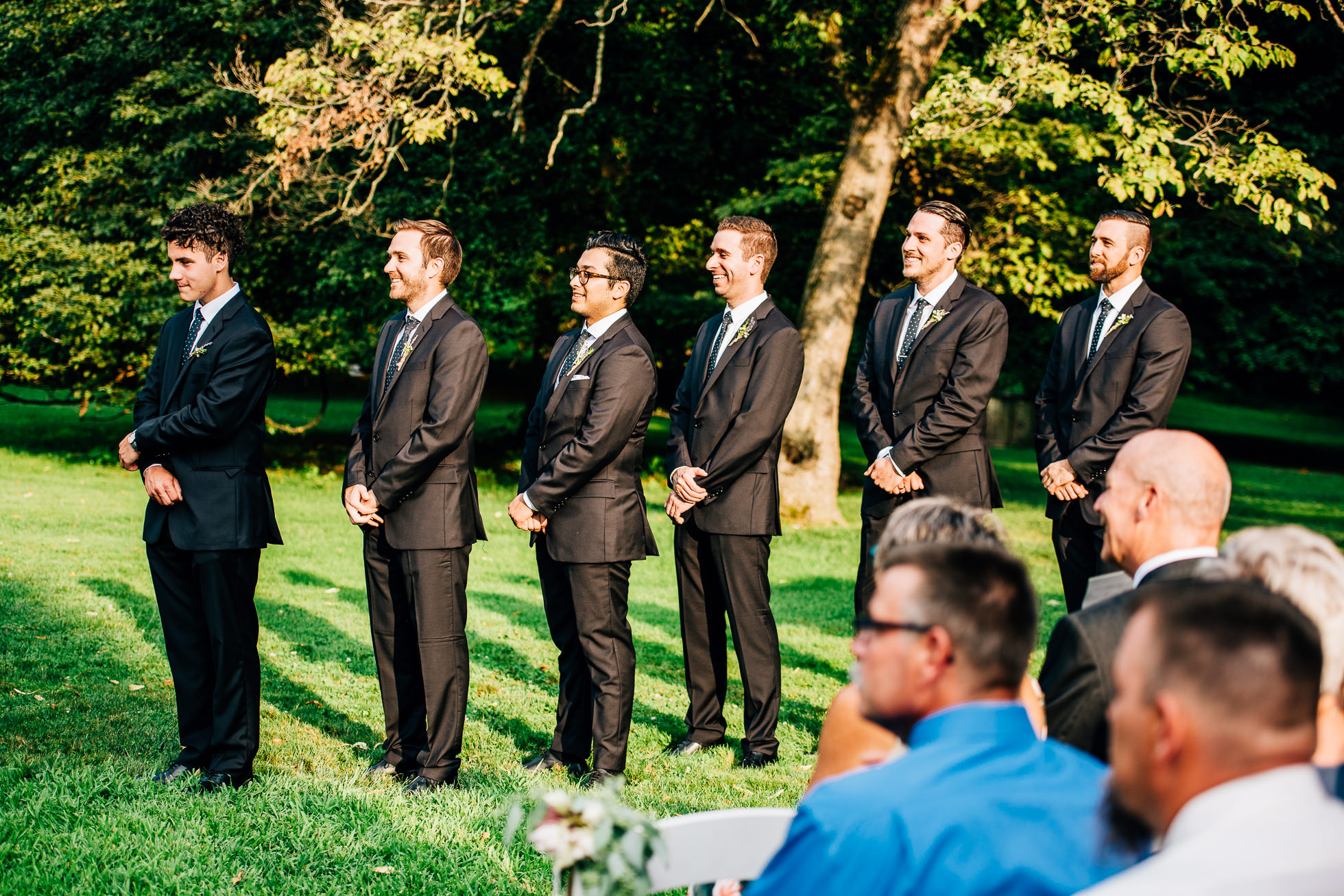 wedding ceremony groomsmen at lyndhurst castle photographed by traverse the tides