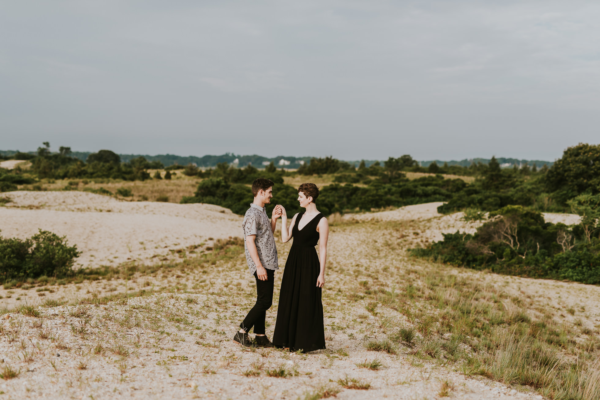 black maxi dress engagement photos photographed by traverse the tides