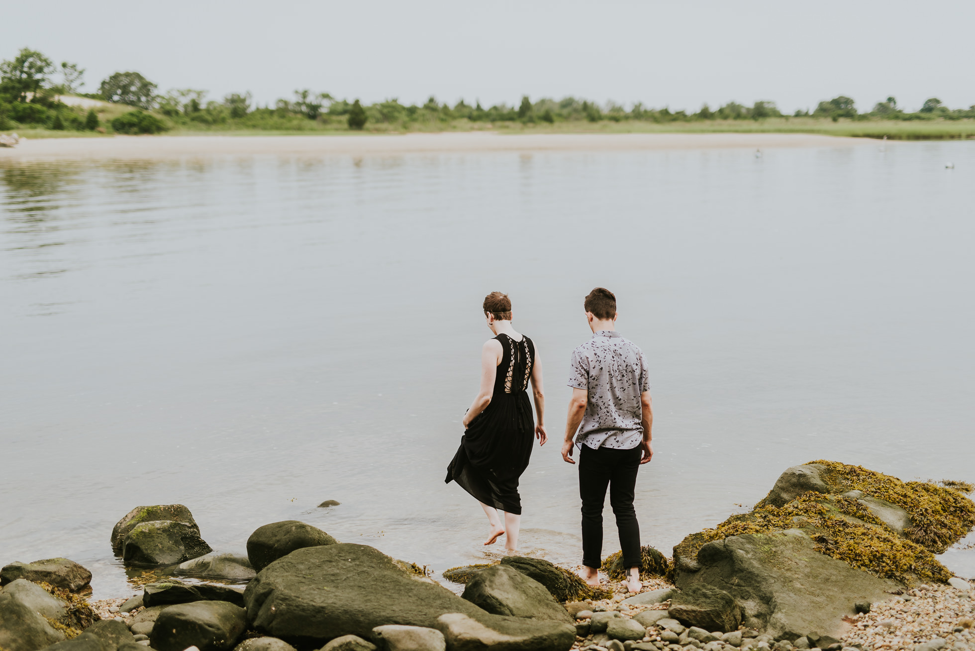 couple in water engagement photographed by traverse the tides