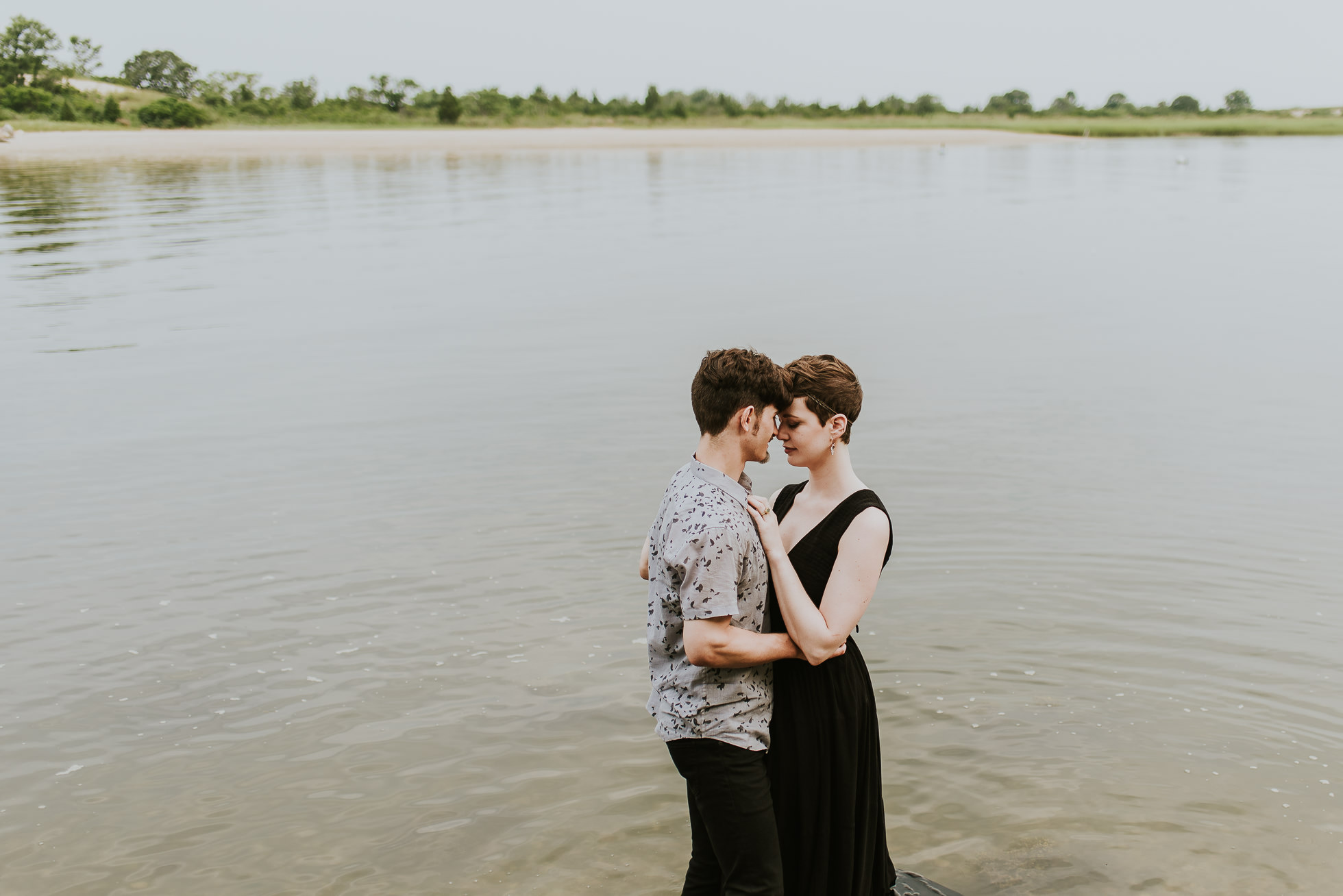intimate couple in water photographed by traverse the tides