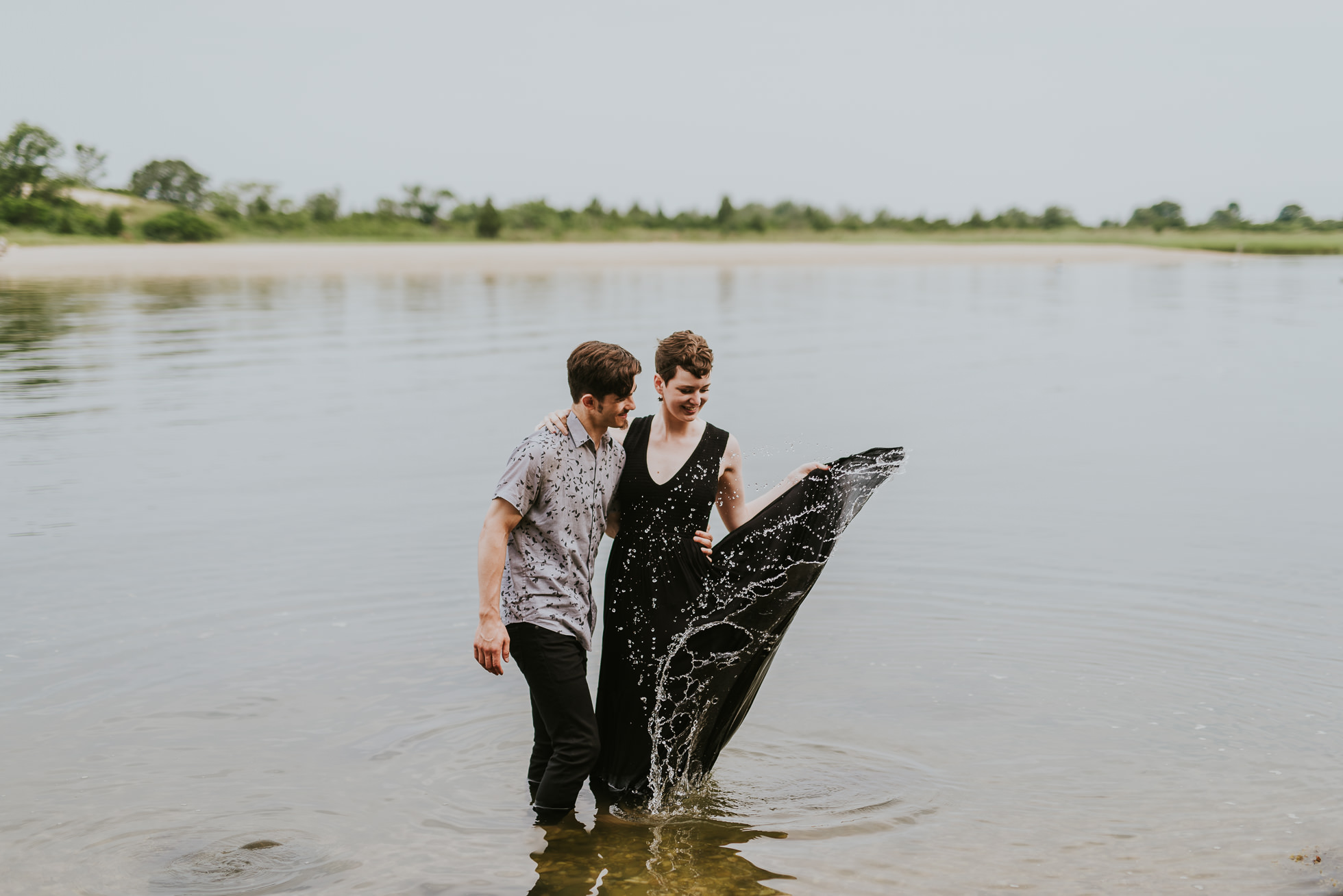 dress in water engagement photographed by traverse the tides