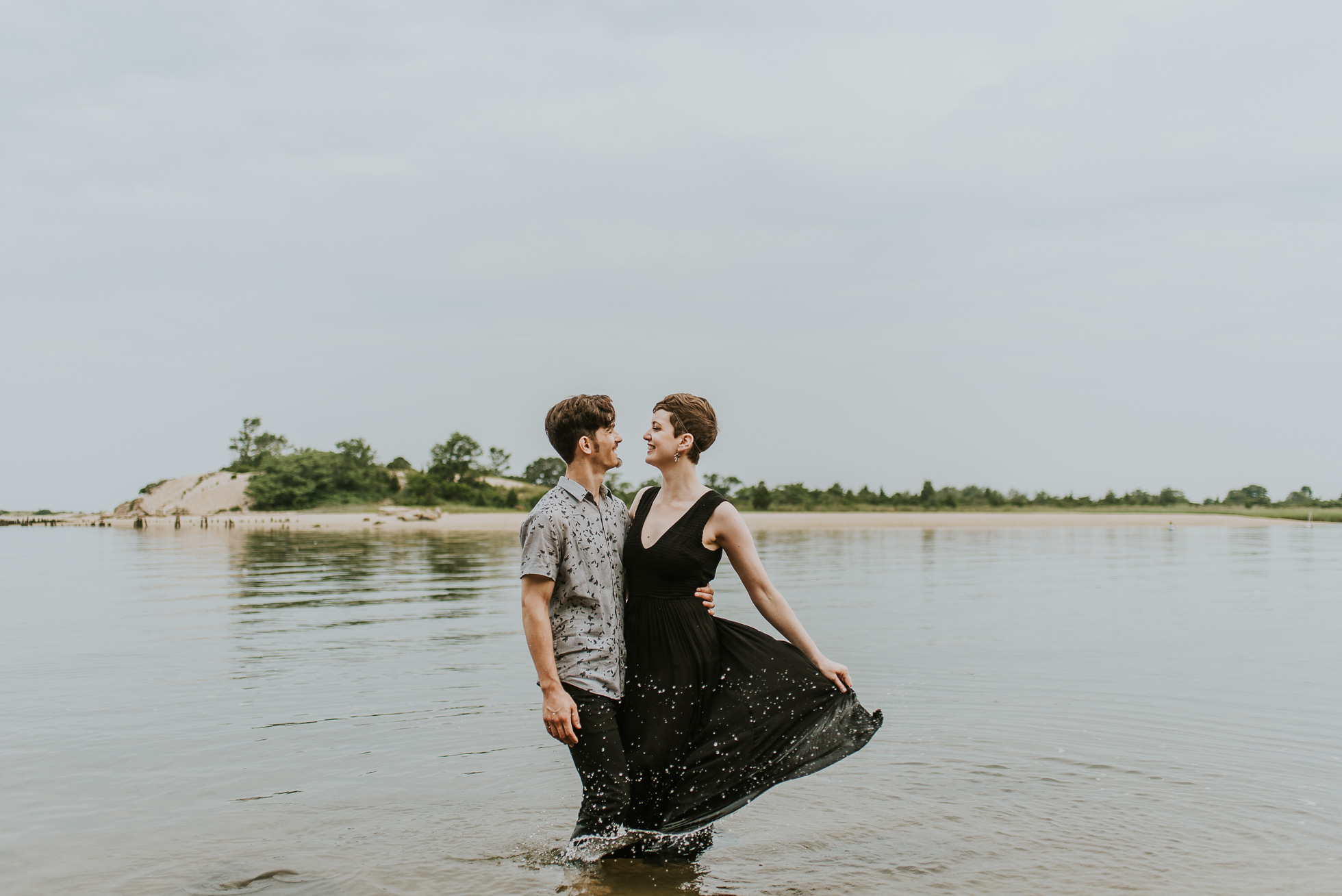 engagement session in water photographed by traverse the tides