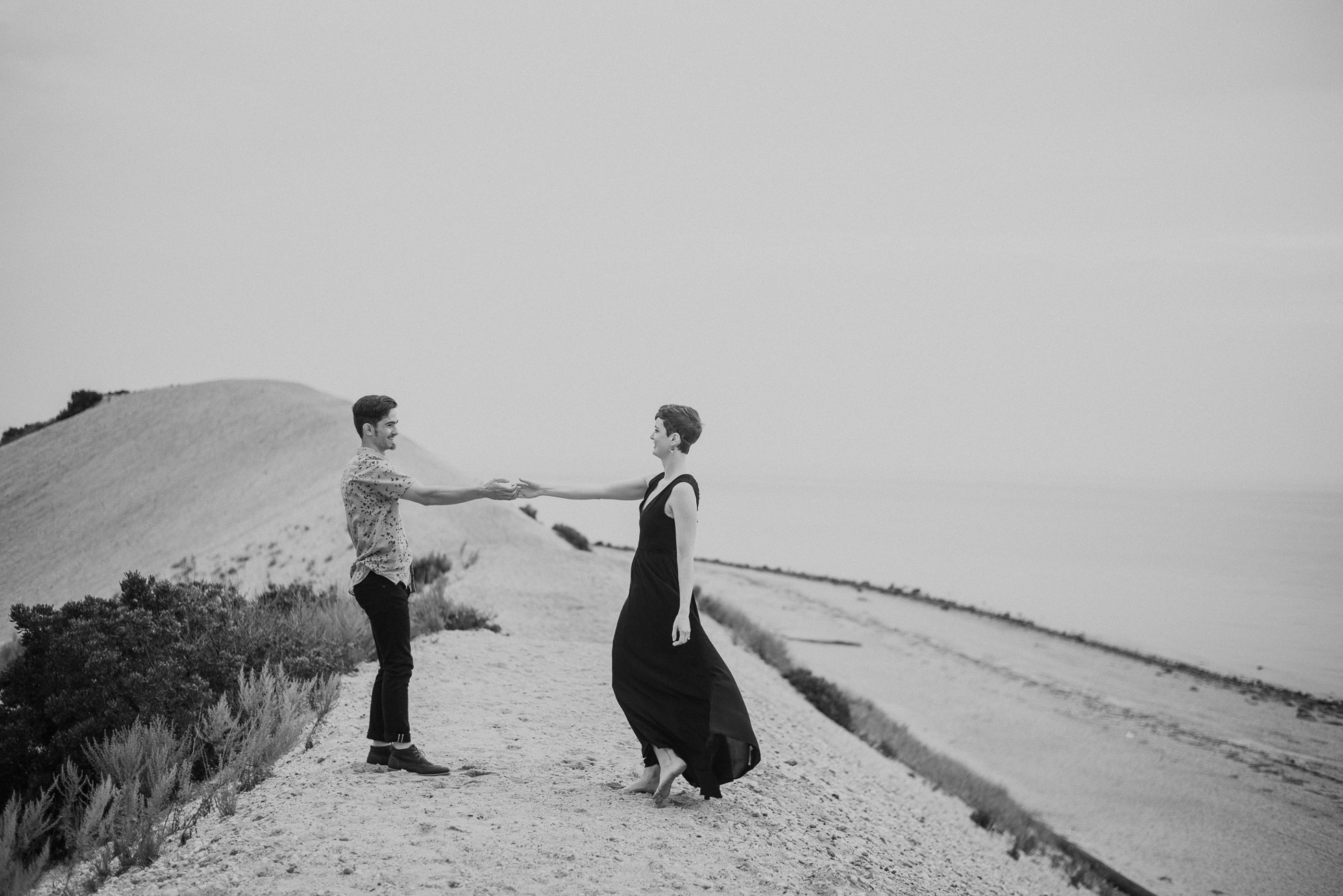 beach engagement photos photographed by traverse the tides