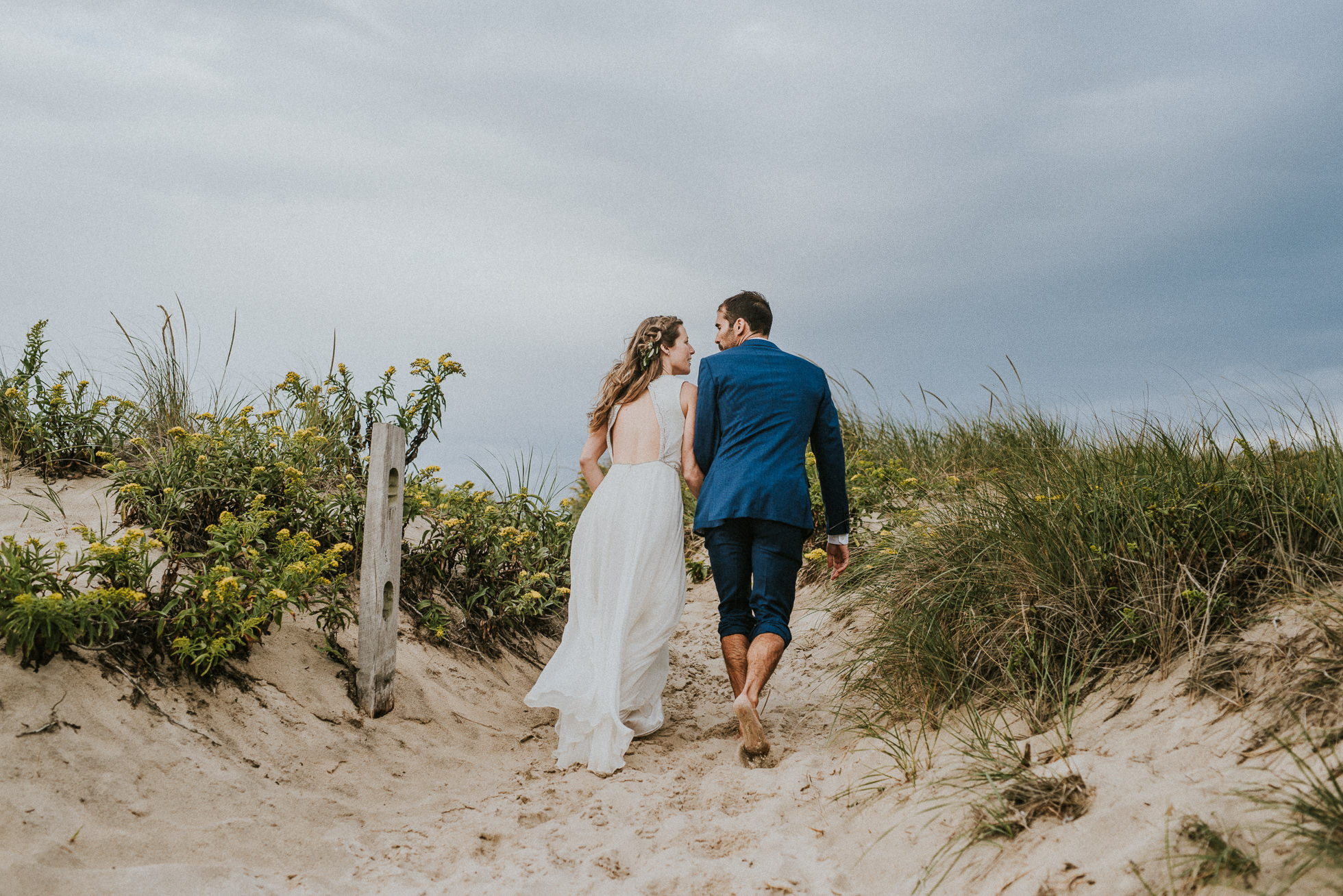 bride and groom staring into each others eyes Montauk wedding photographed by Traverse the Tides