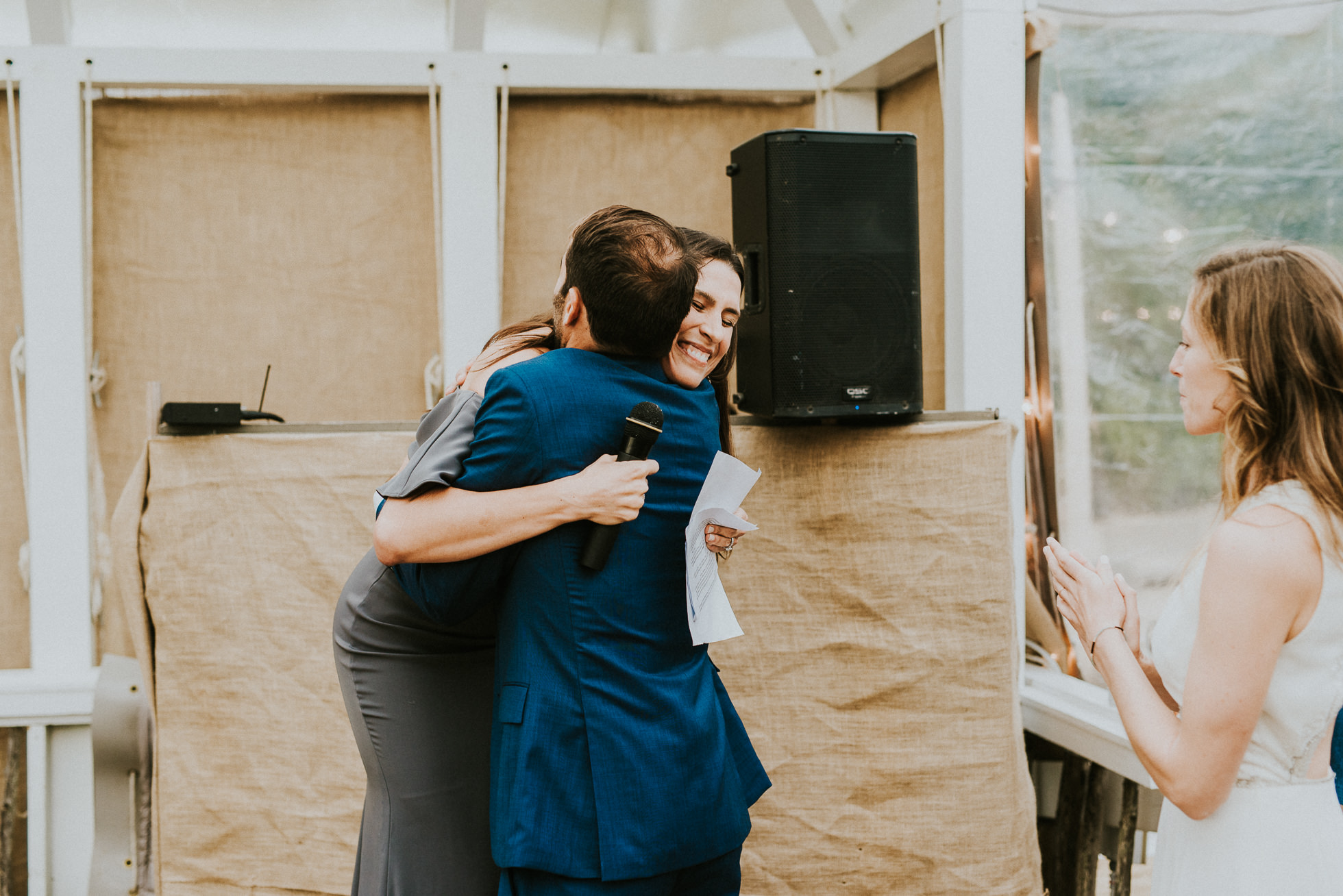 groom hugging sister at the surf lodge Montauk wedding photographed by Traverse the Tides