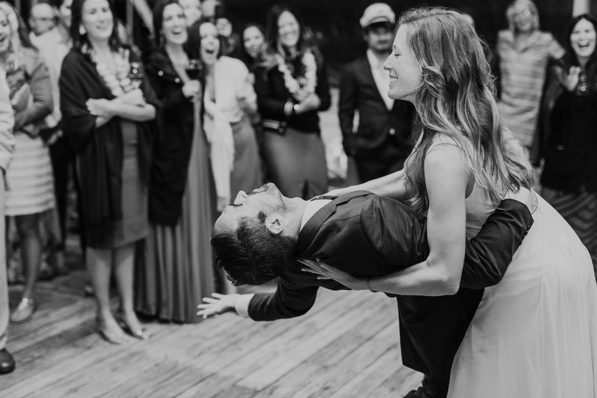 bride dipping groom first dance at the surf lodge reception Montauk wedding photographed by Traverse the Tides