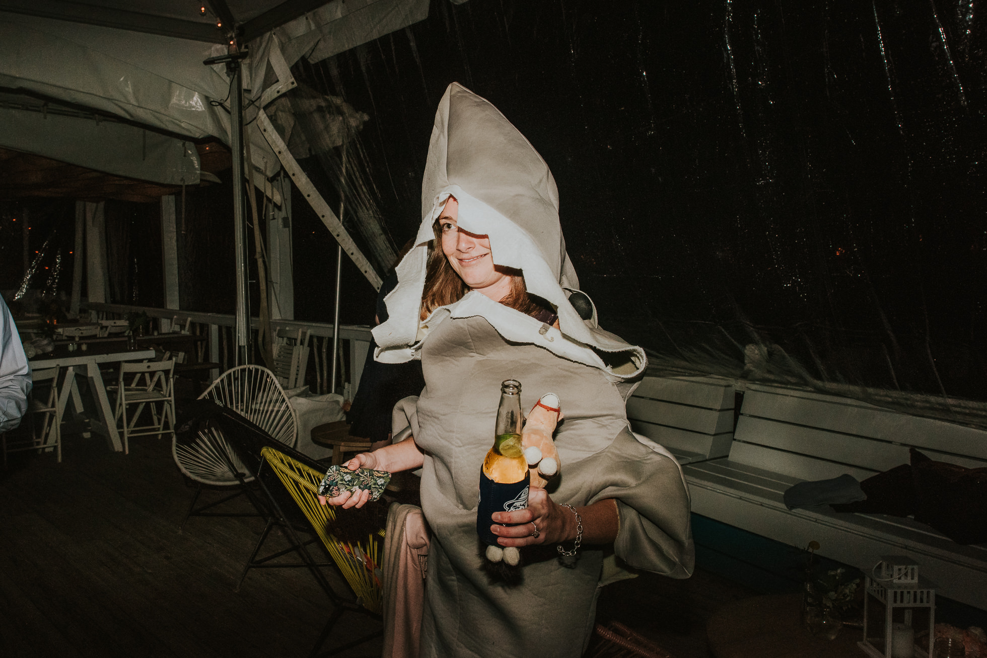 girl in shark costume at reception Montauk wedding photographed by Traverse the Tides