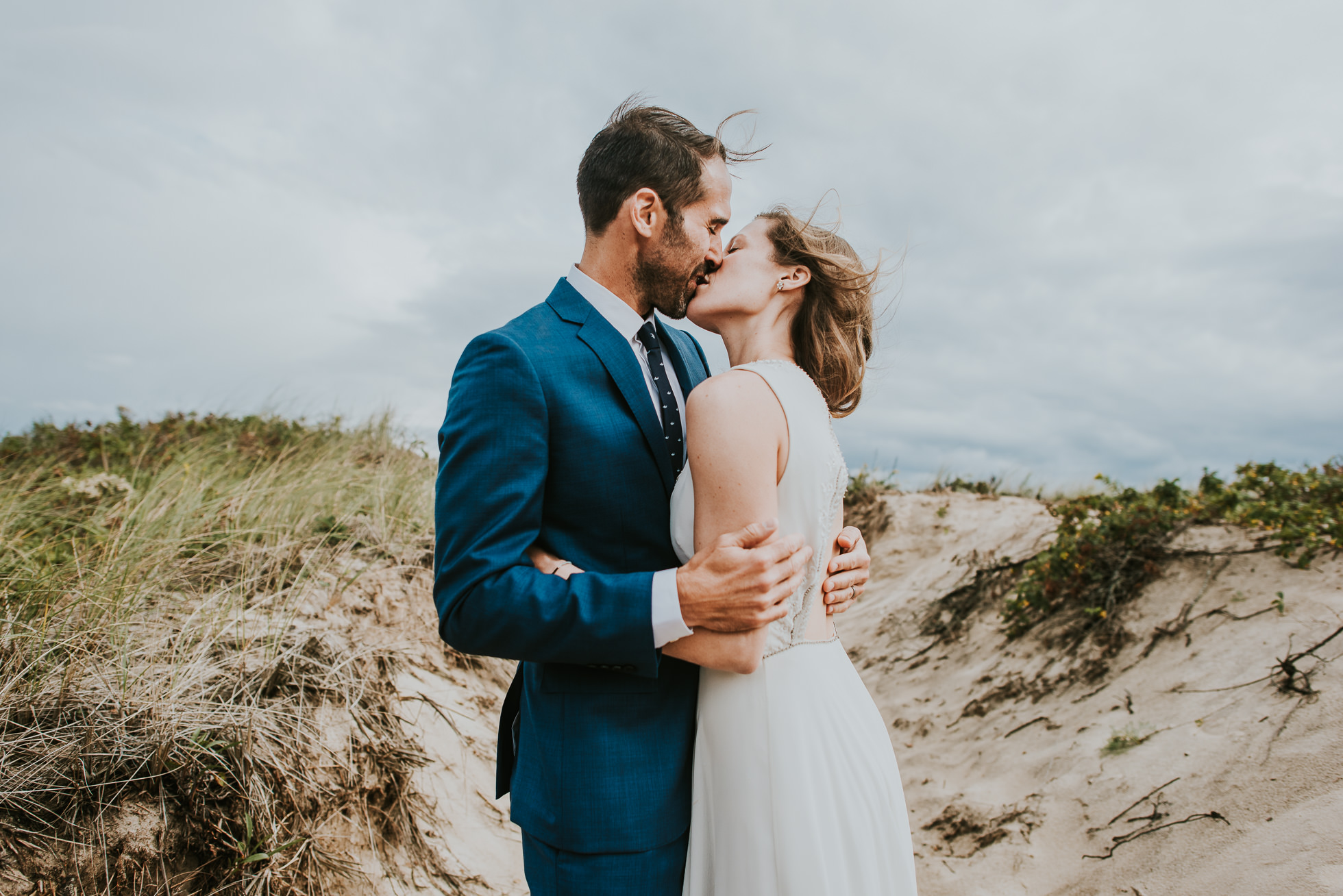 boho bride and groom at the beach Montauk wedding photographed by Traverse the Tides