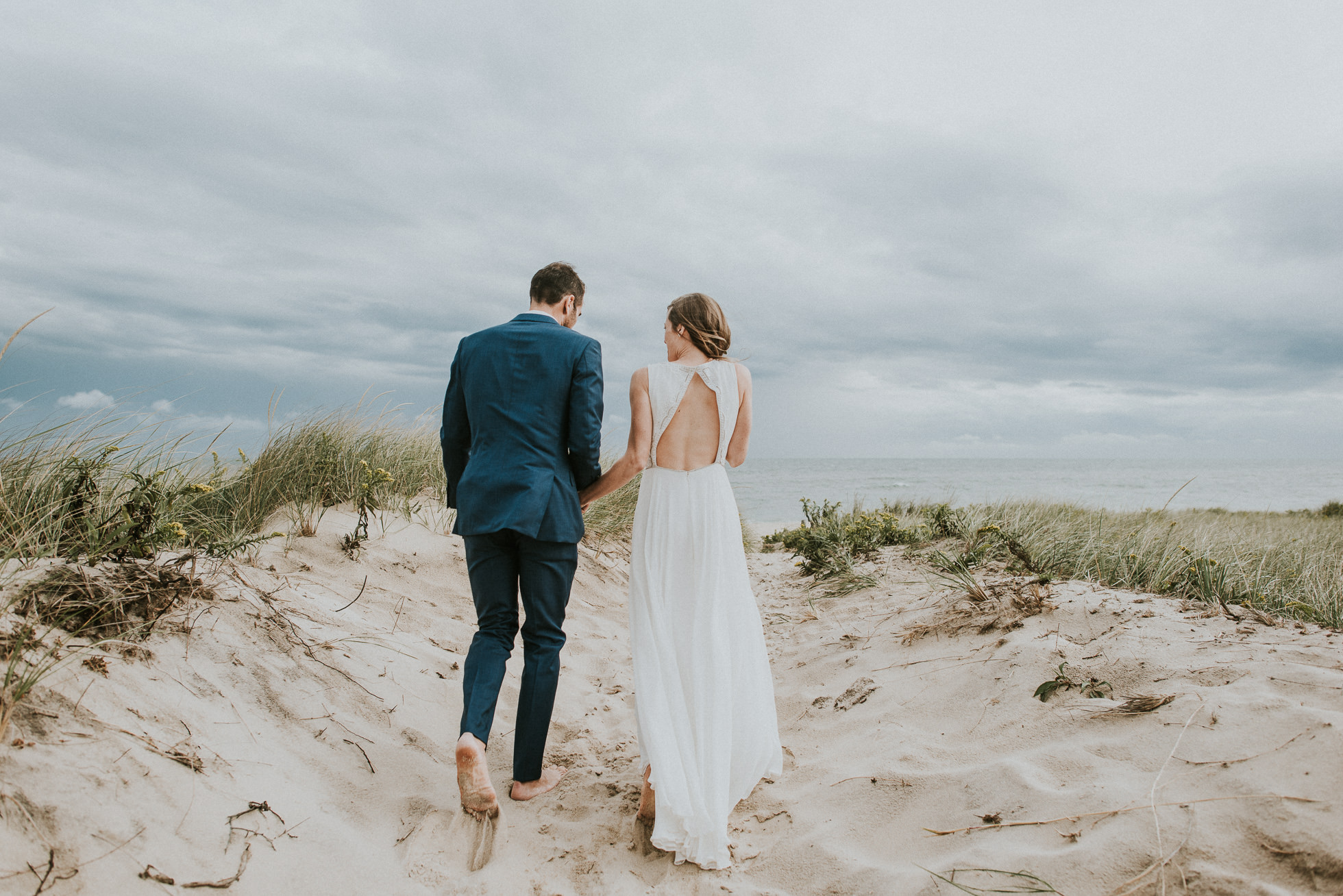 barefoot bride and groom at the beach Montauk wedding photographed by Traverse the Tides