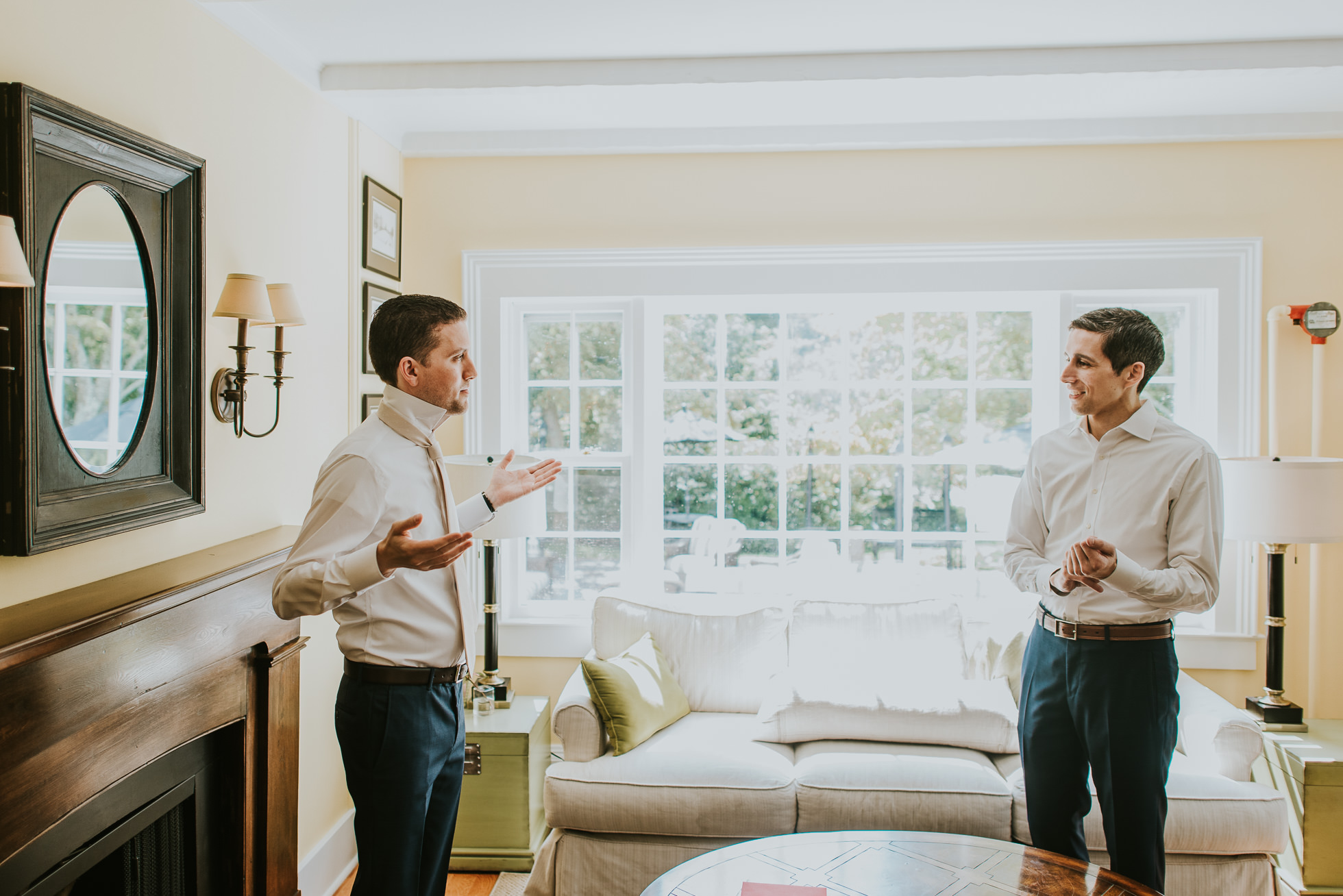 groomsmen getting dressed Hamptons wedding