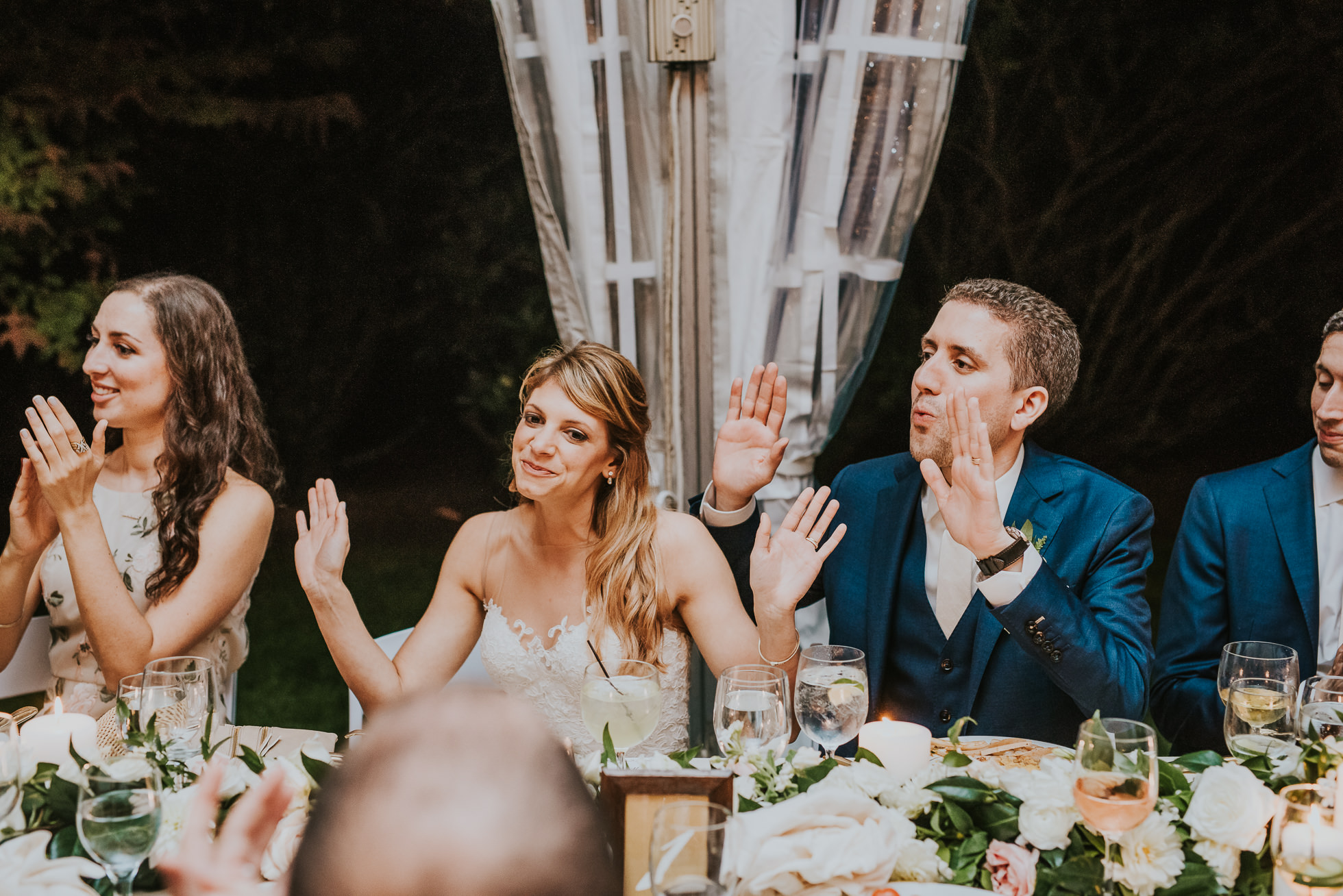 bride and groom cheering the Hedges Inn reception