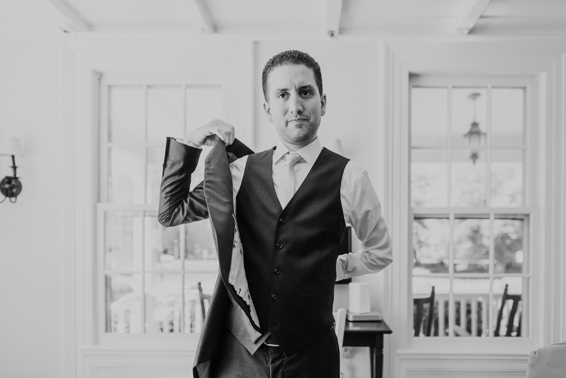 groom getting ready at Hamptons wedding