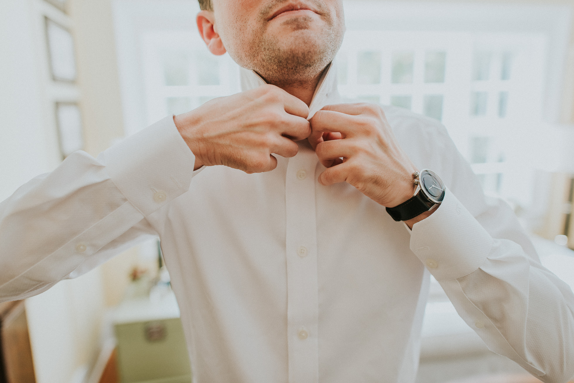 groom getting ready in the Hamptons